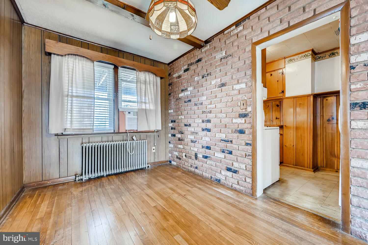 318 Arden Road West Baltimore, MD 21225 - Photo 10 of 32 wooden floor in an empty room