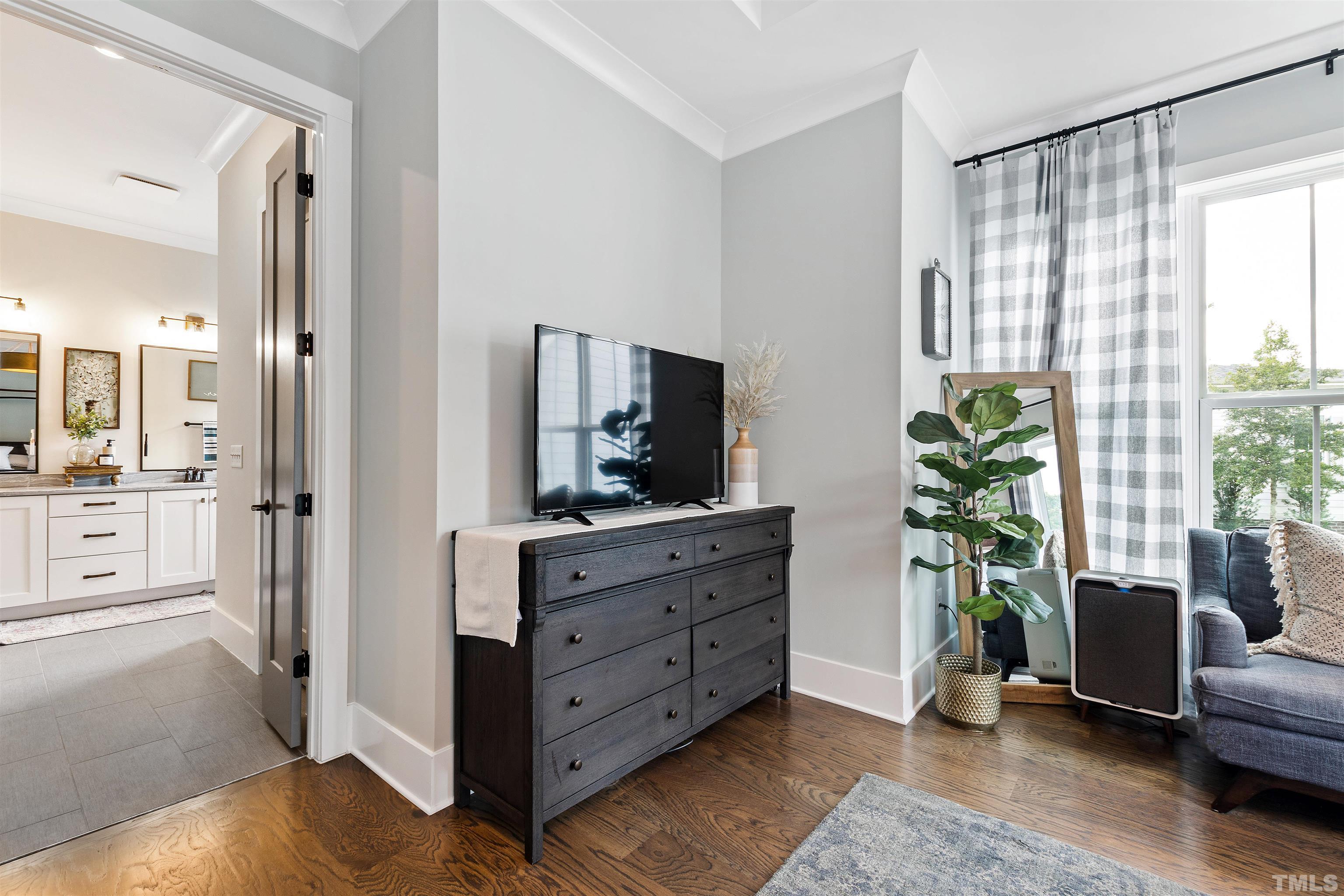 700 Daniel Ridge Rd. Wendell, NC 27591 - Photo 26 of 62 a room with furniture and flat screen tv