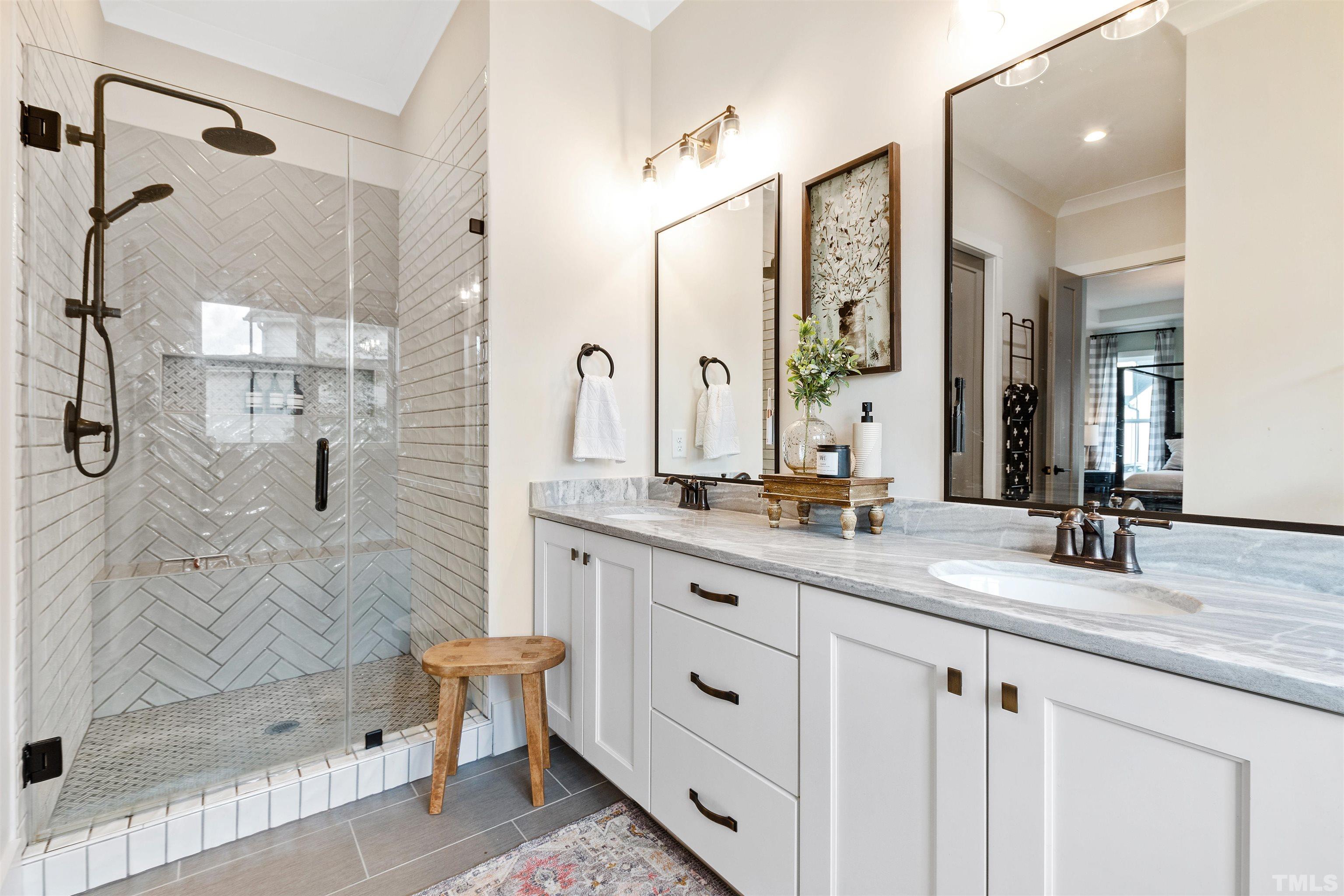 700 Daniel Ridge Rd. Wendell, NC 27591 - Photo 29 of 62 a bathroom with a granite countertop sink mirror and shower