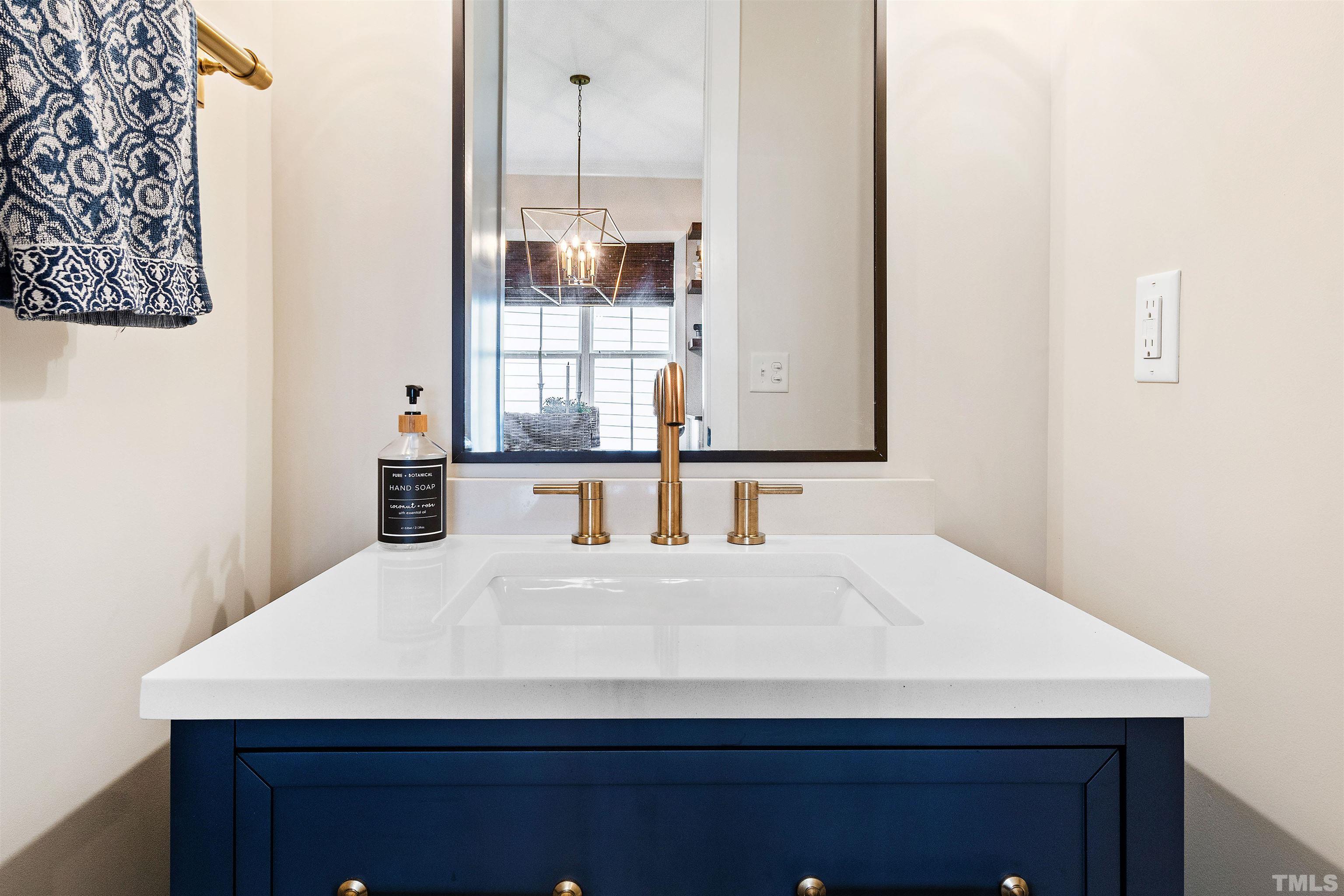700 Daniel Ridge Rd. Wendell, NC 27591 - Photo 32 of 62 a bathroom with a sink and a mirror