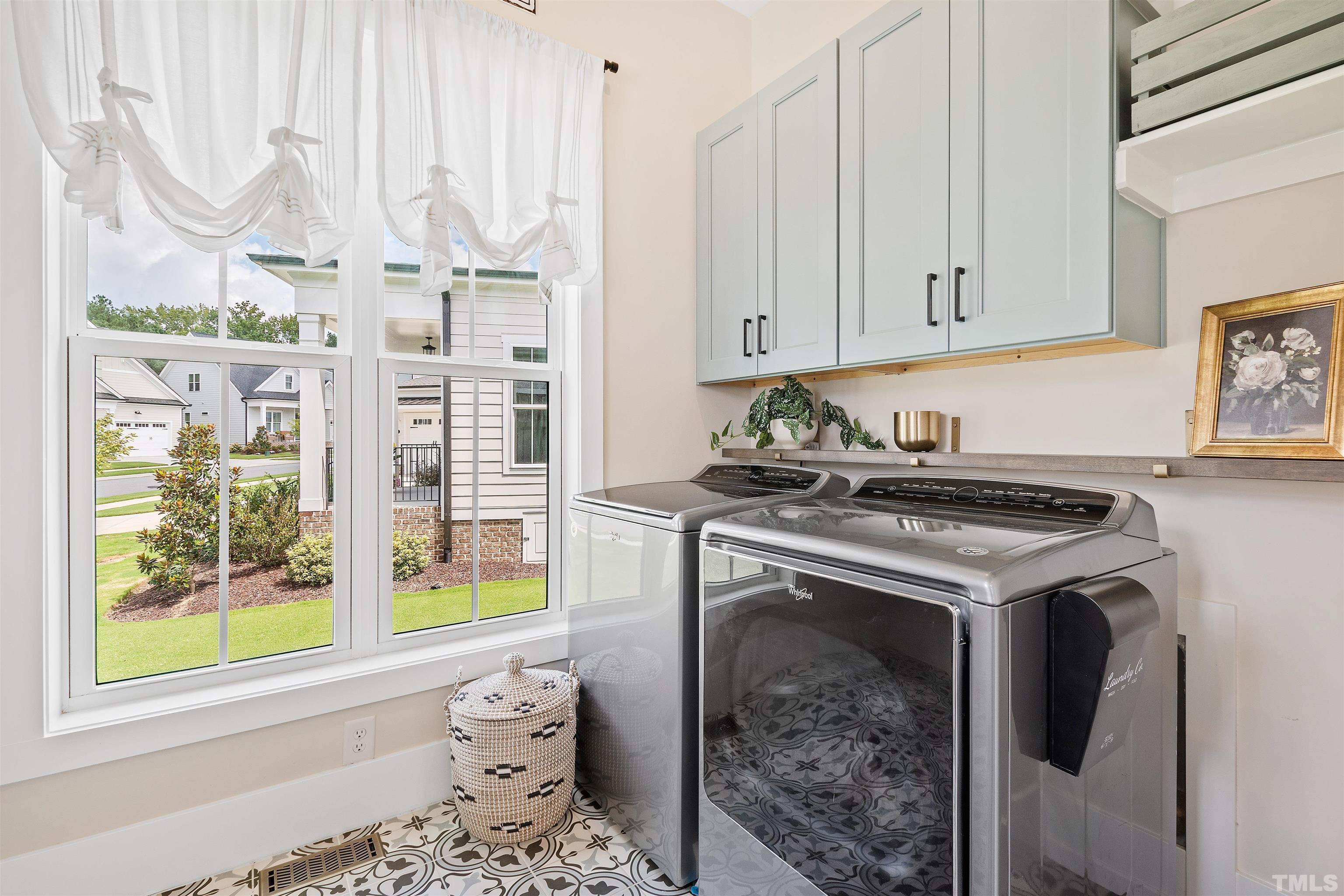 700 Daniel Ridge Rd. Wendell, NC 27591 - Photo 33 of 62 a kitchen with stainless steel appliances granite countertop a stove a refrigerator and a white cabinets