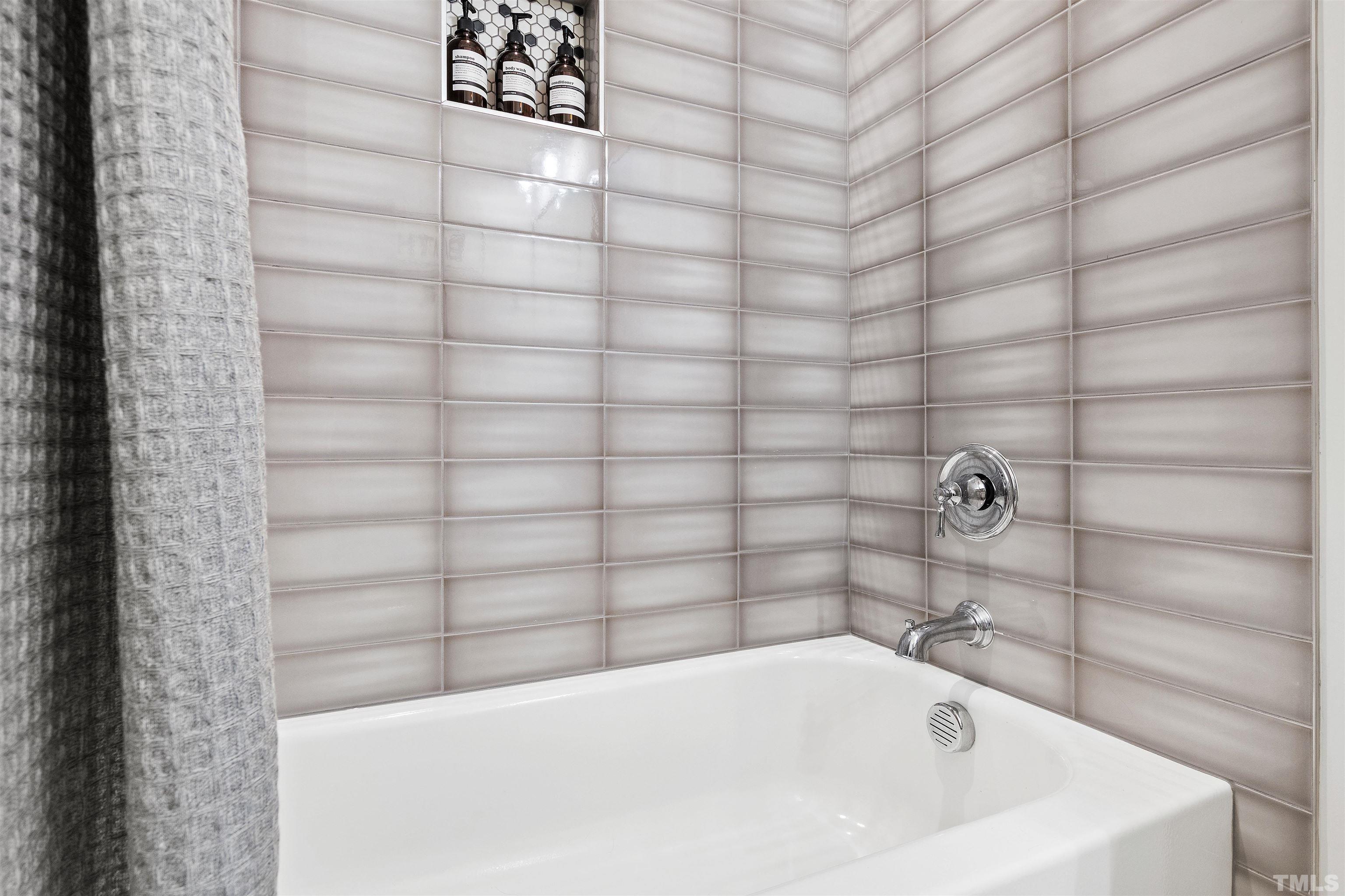 700 Daniel Ridge Rd. Wendell, NC 27591 - Photo 43 of 62 a bathroom with a bathtub