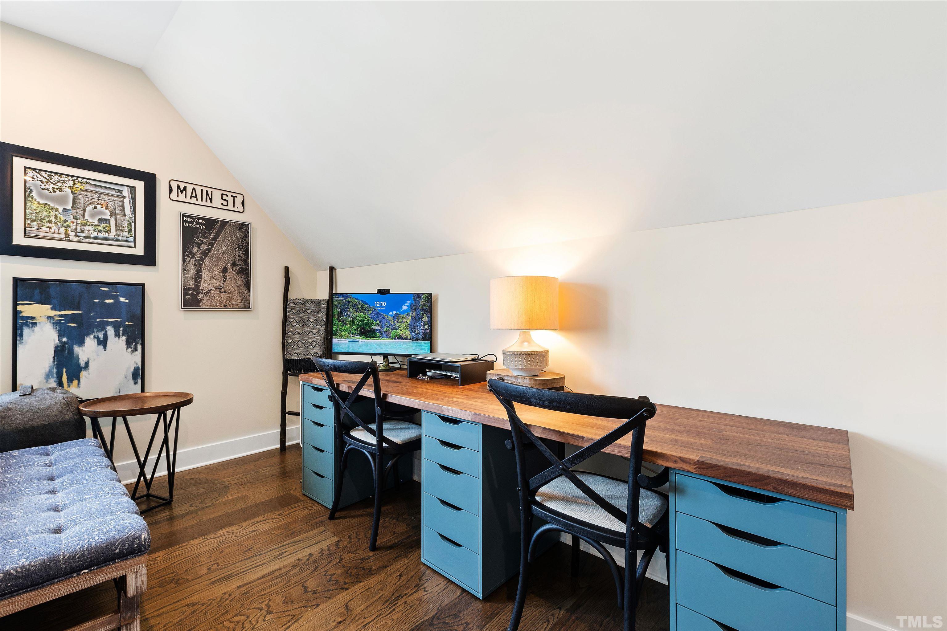 700 Daniel Ridge Rd. Wendell, NC 27591 - Photo 48 of 62 a view of a workspace with furniture and wooden floor