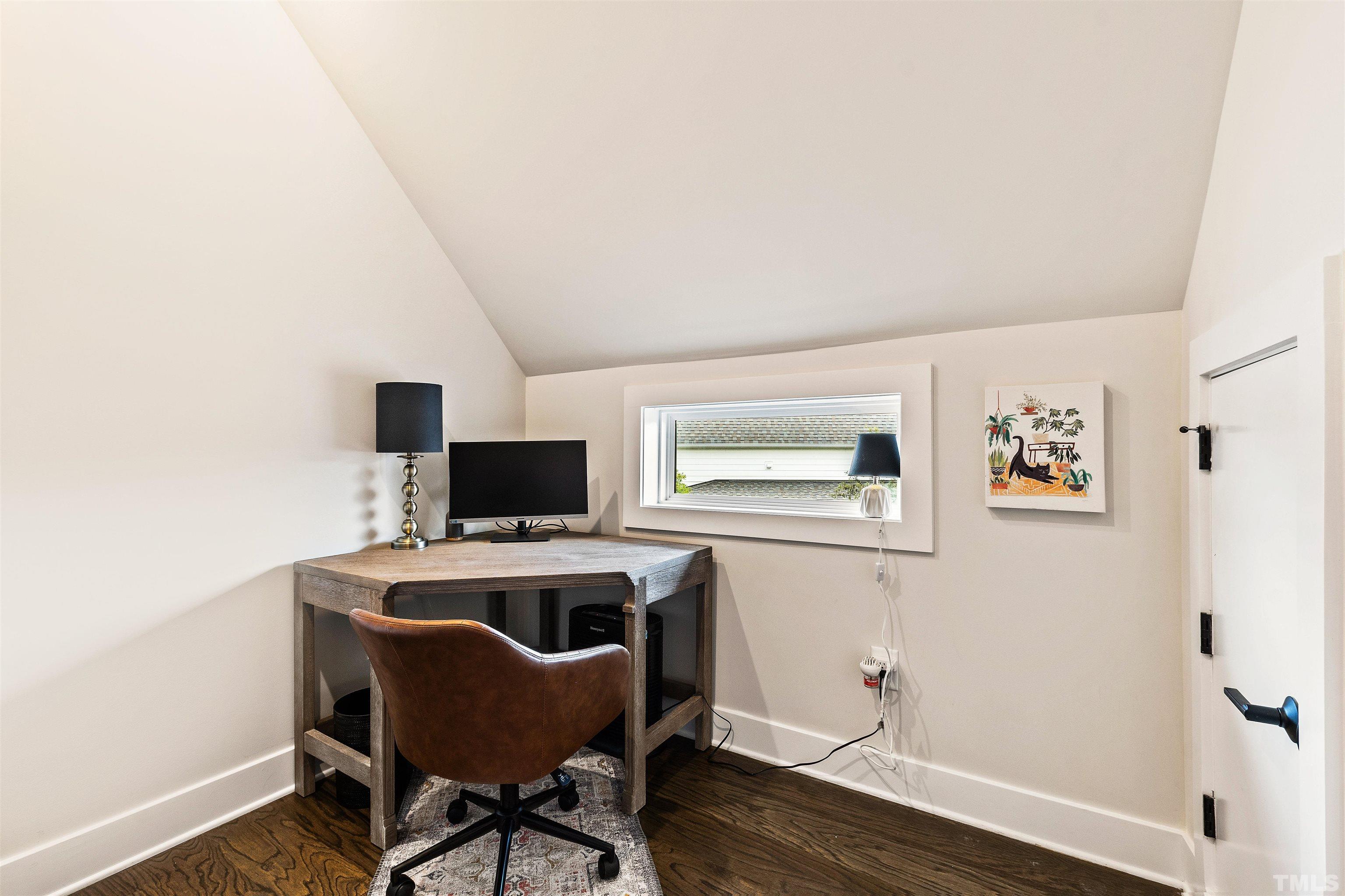 700 Daniel Ridge Rd. Wendell, NC 27591 - Photo 49 of 62 a view of a workspace with furniture and wooden floor