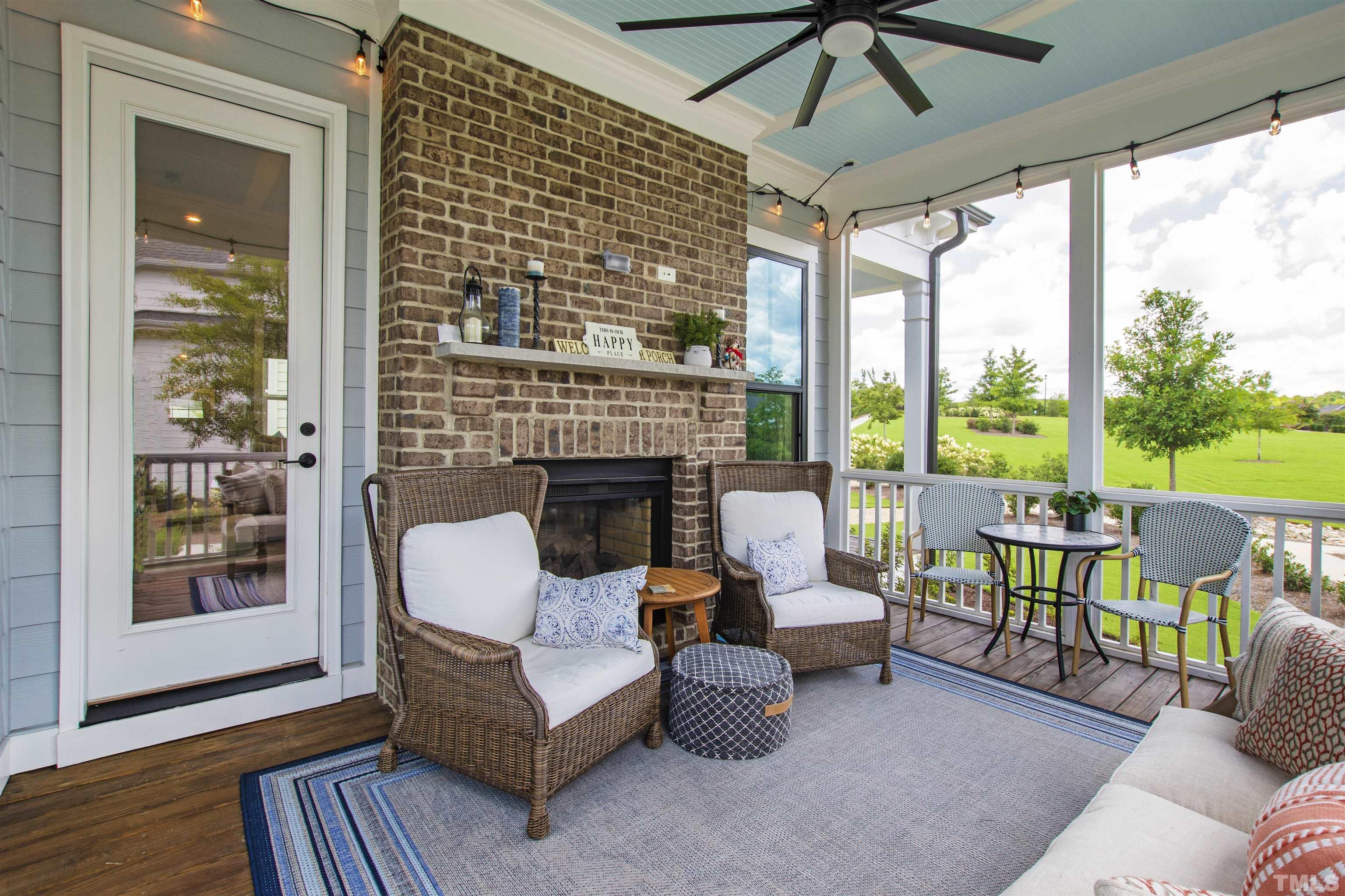 700 Daniel Ridge Rd. Wendell, NC 27591 - Photo 5 of 62 a living room with furniture and a floor to ceiling window