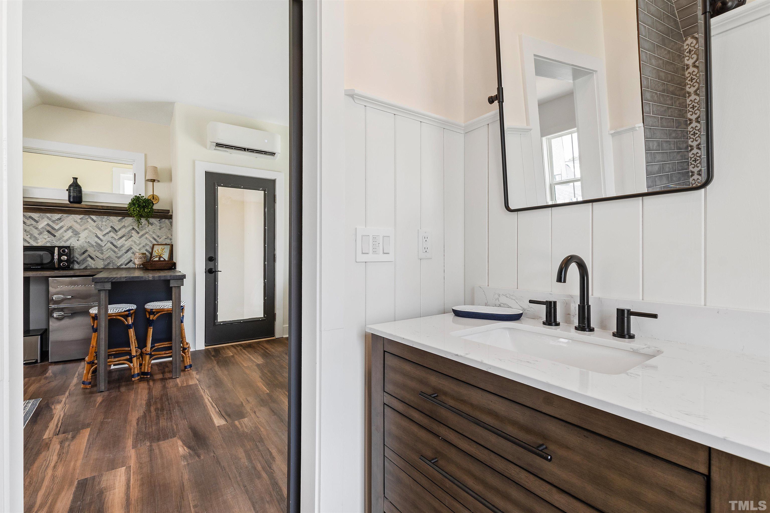700 Daniel Ridge Rd. Wendell, NC 27591 - Photo 53 of 62 a bathroom with a sink and a mirror