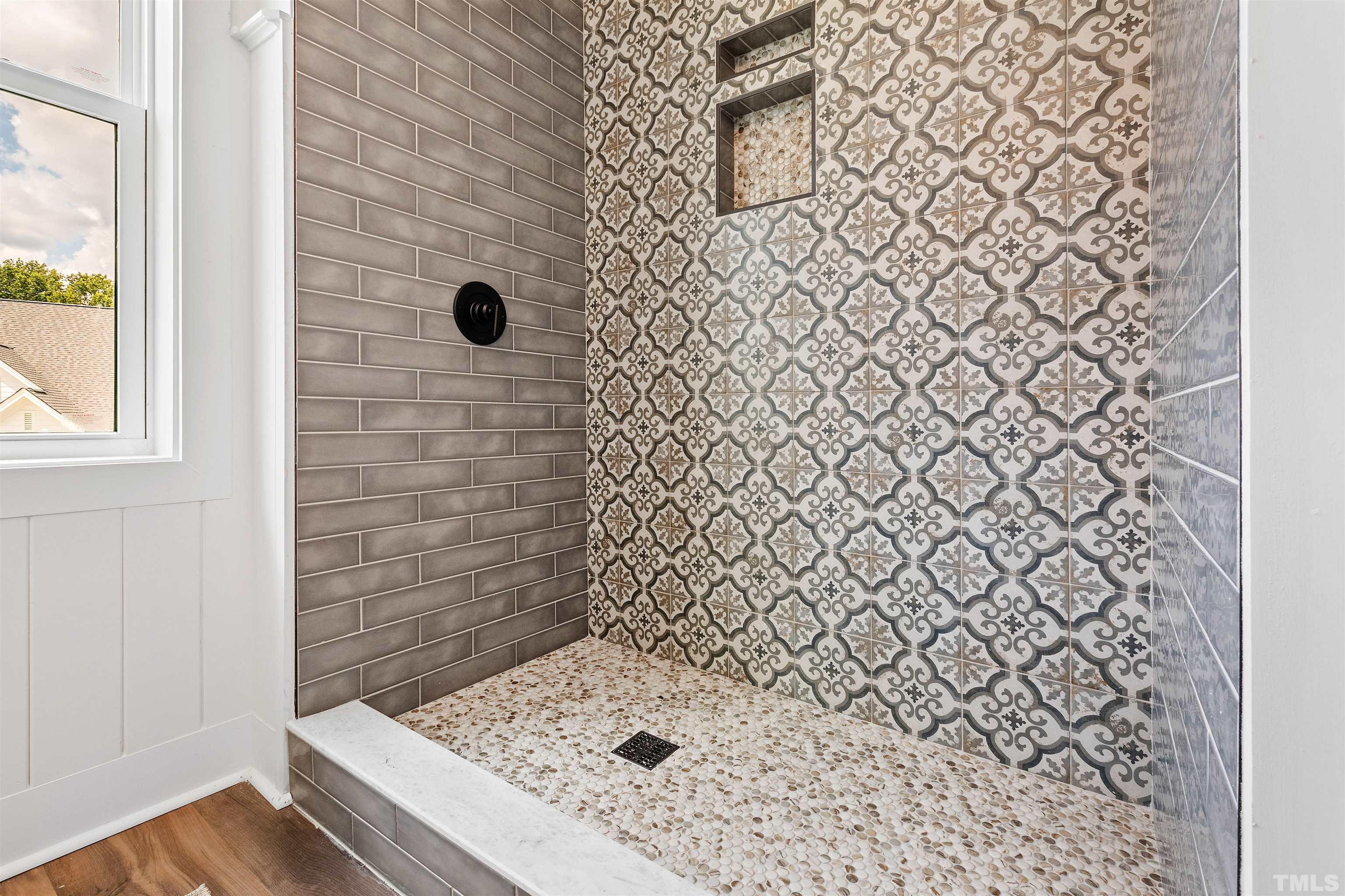 700 Daniel Ridge Rd. Wendell, NC 27591 - Photo 54 of 62 a bathroom with a shower