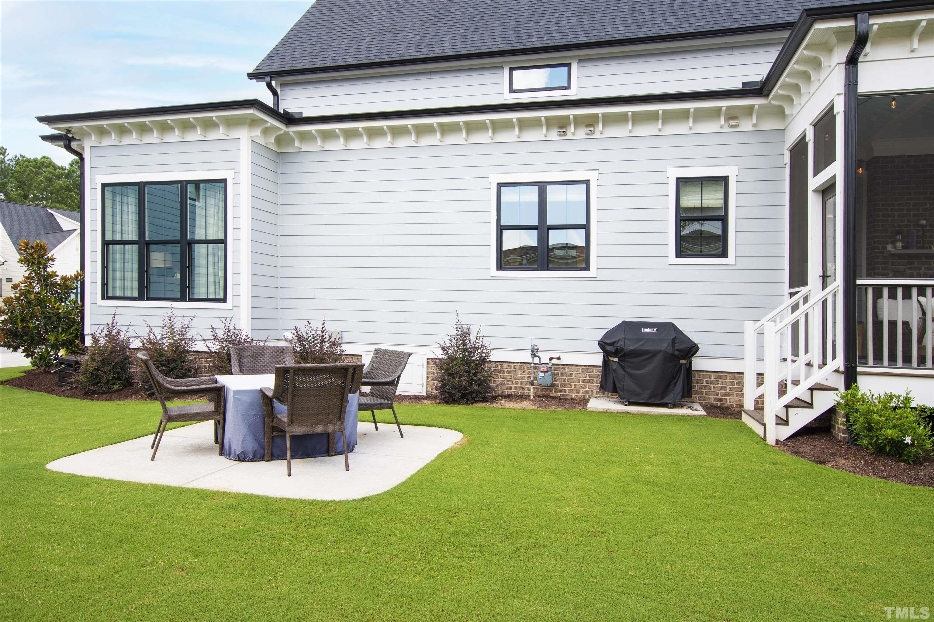 700 Daniel Ridge Rd. Wendell, NC 27591 - Photo 61 of 62 a view of a house with backyard porch and sitting area