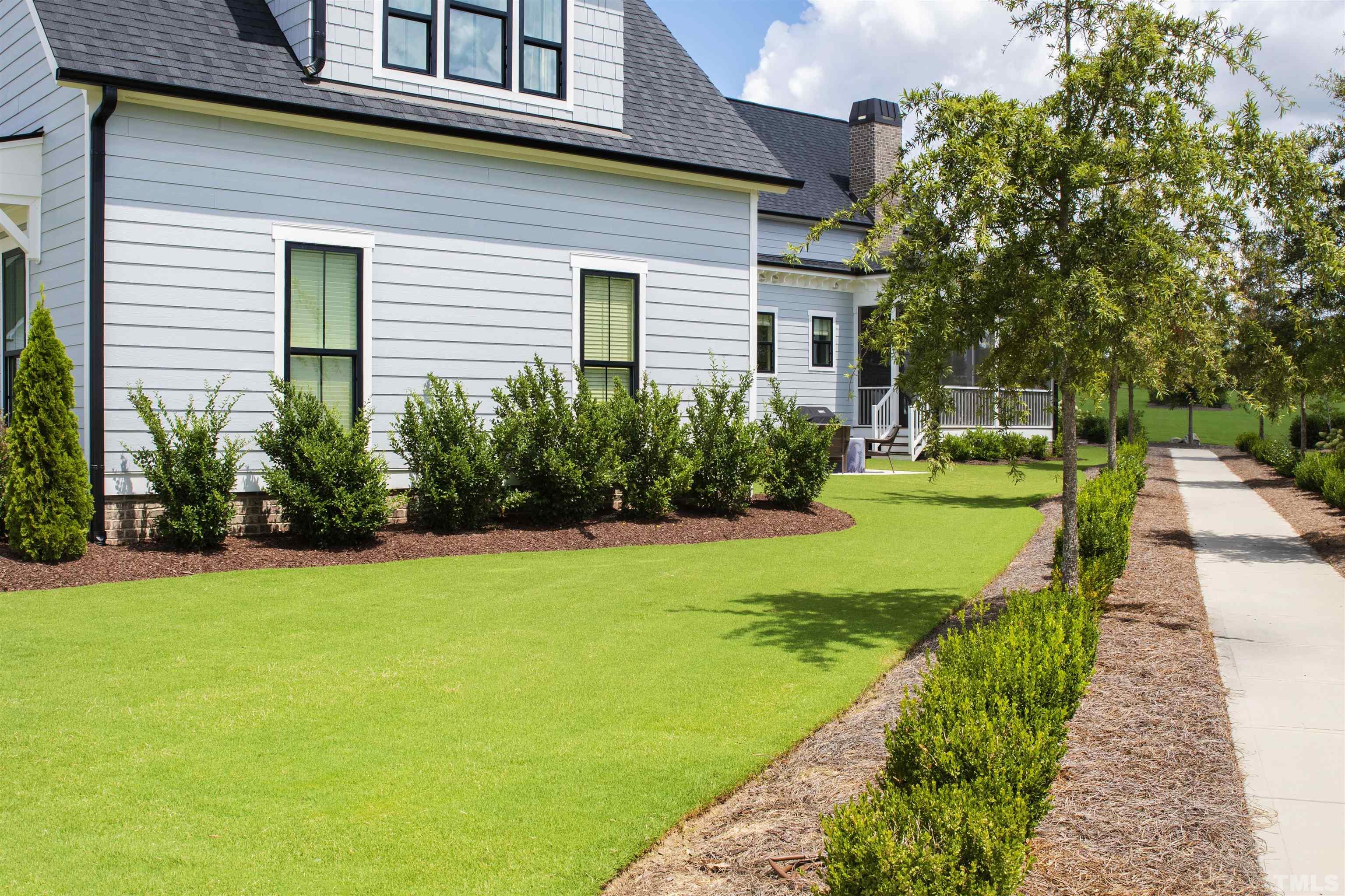 700 Daniel Ridge Rd. Wendell, NC 27591 - Photo 62 of 62 a view of a house with backyard and garden
