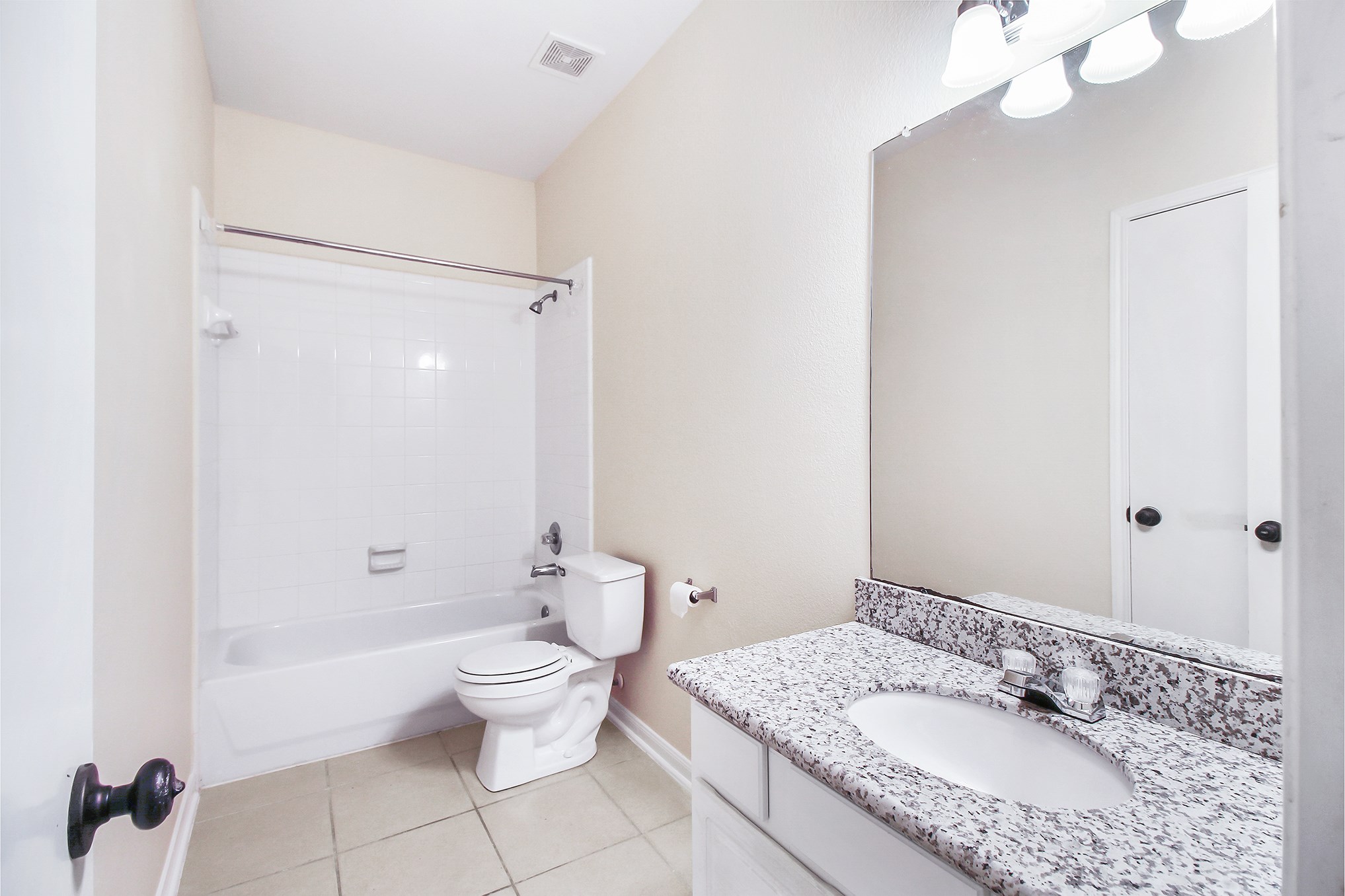 1814 Parkfair Court Katy, TX 77450 - Photo 29 of 36 Large guest bathroom offers a storage linens closet with built-in shelving. New granite counter top, tile shower, and tile flooring.