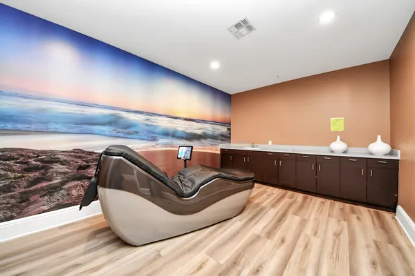 a view of a studio with wooden floor