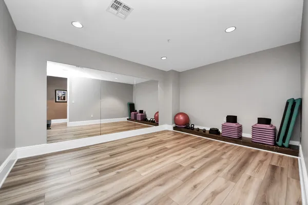 a view of a room with gym equipment