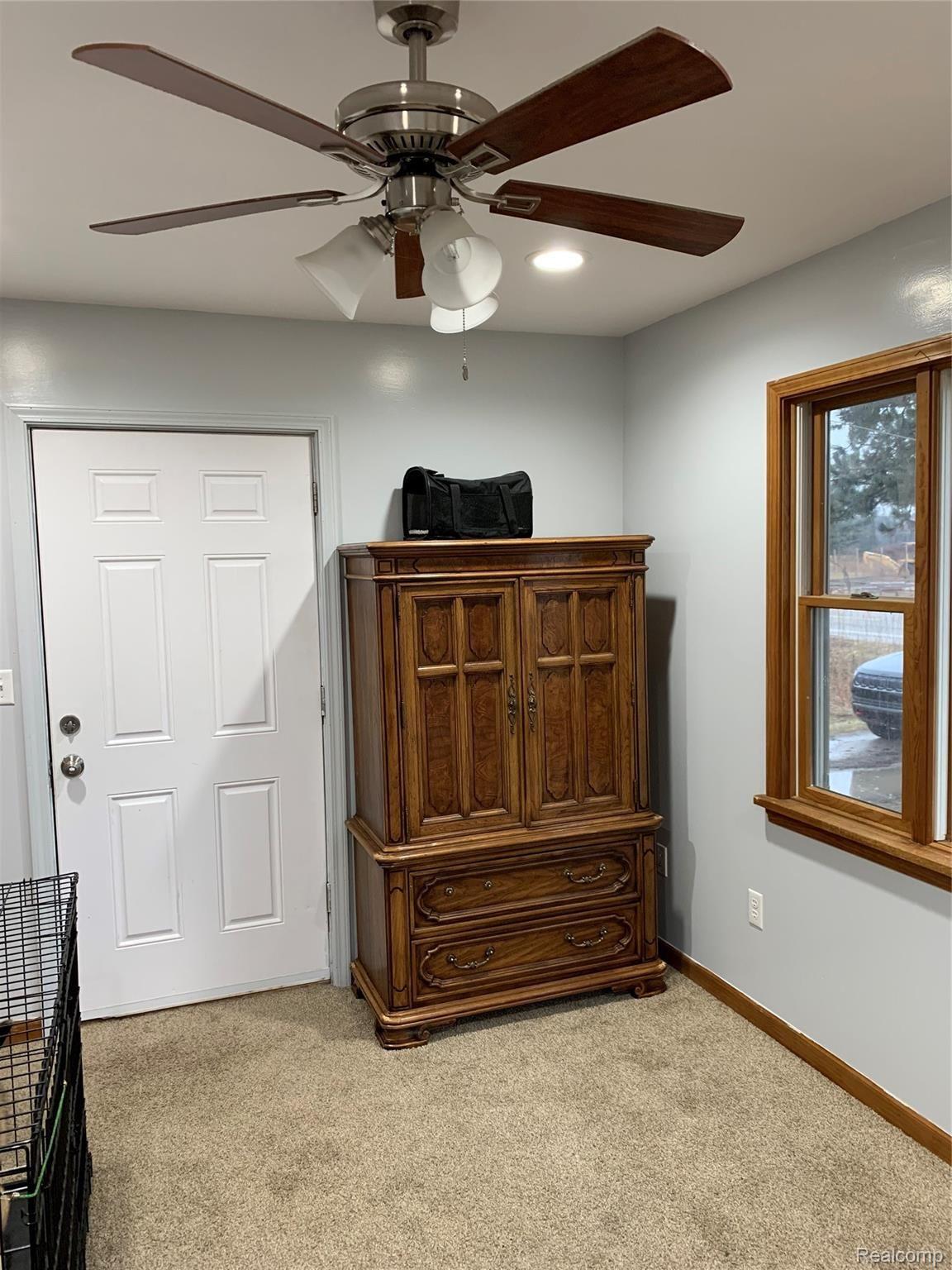 7078 Fargo Road Avoca, MI 48006 - Photo 10 of 41 front room facing door