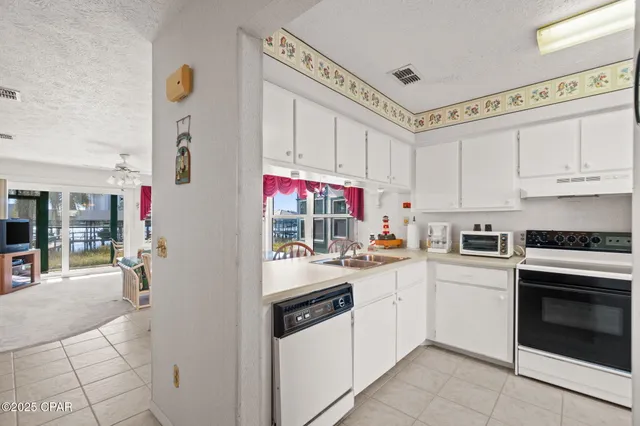 $230,000 | 7813 North Lagoon Drive, Unit 9C, Panama City Beach, FL 32408