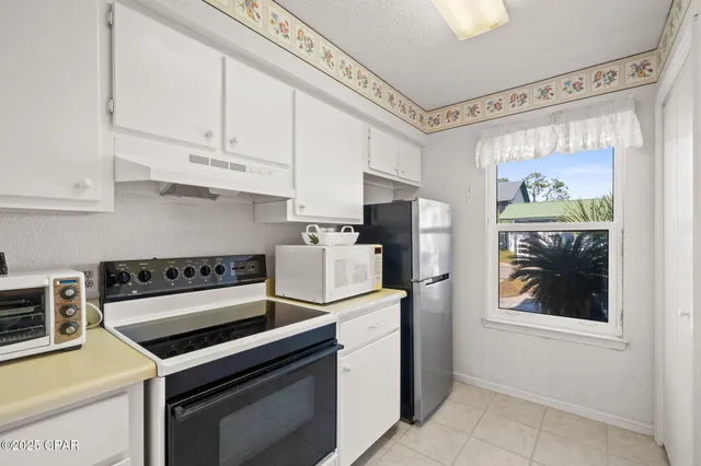 $230,000 | 7813 North Lagoon Drive, Unit 9C, Panama City Beach, FL 32408