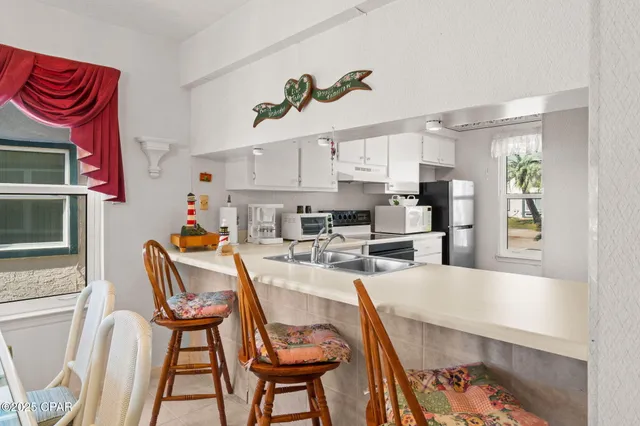 $230,000 | 7813 North Lagoon Drive, Unit 9C, Panama City Beach, FL 32408