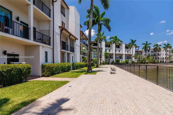 a view of a building with a swimming pool