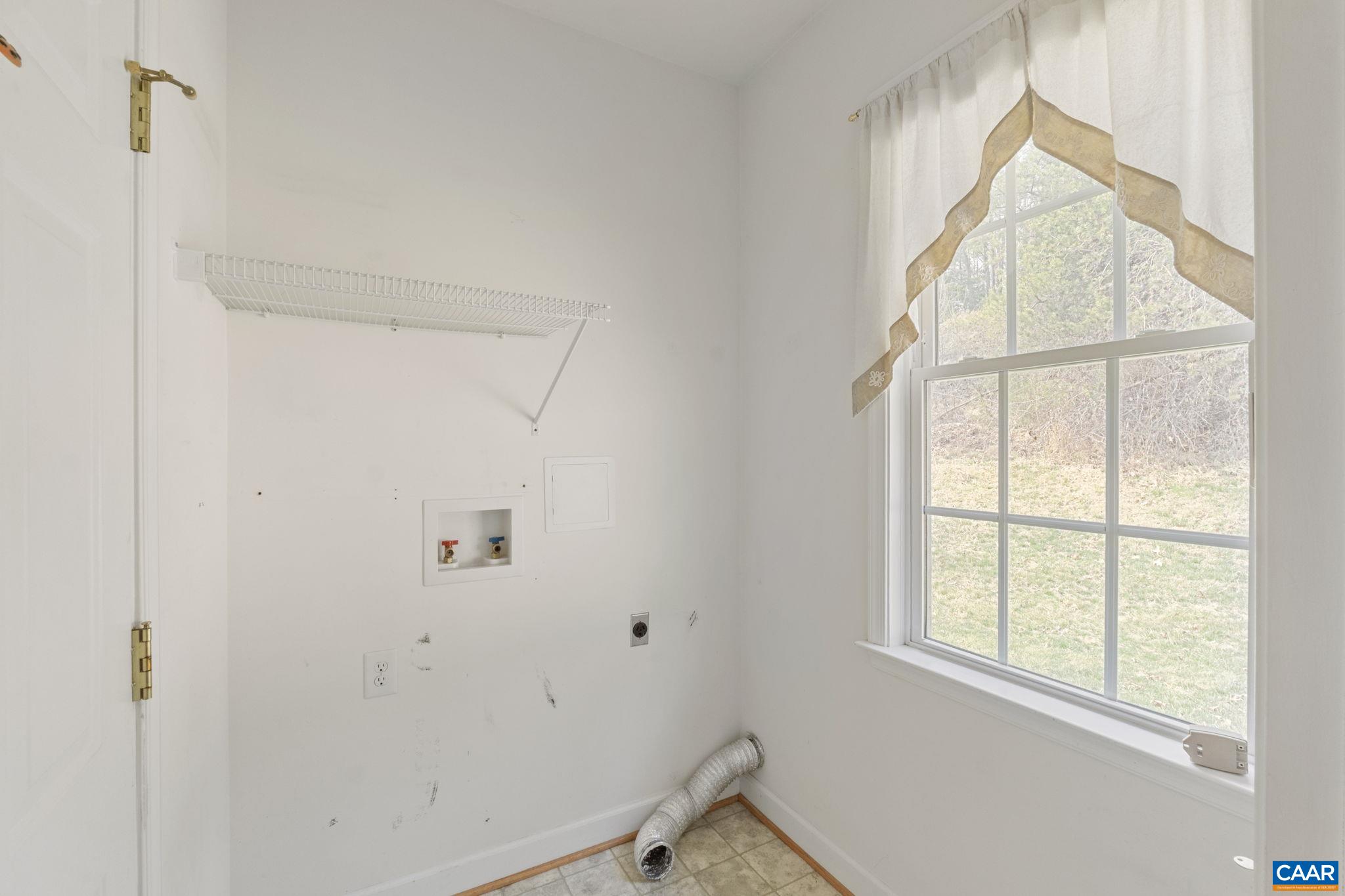 1118 Rustic Willow Lane Charlottesville, VA 22911 - Photo 25 of 33 a view of an empty room with a window