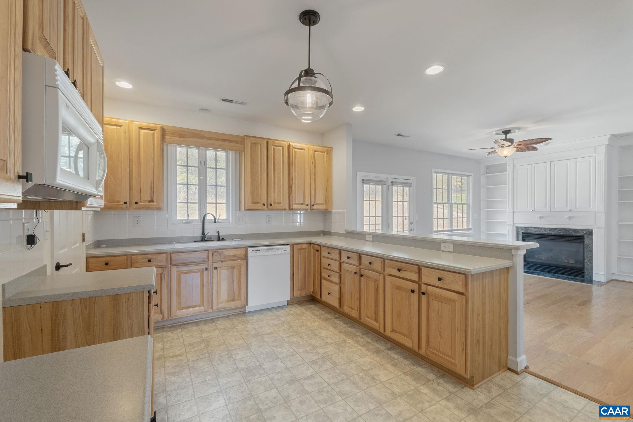 1118 Rustic Willow Lane Charlottesville, VA 22911 - Photo 4 of 33 a large kitchen with stainless steel appliances granite countertop a sink and cabinets