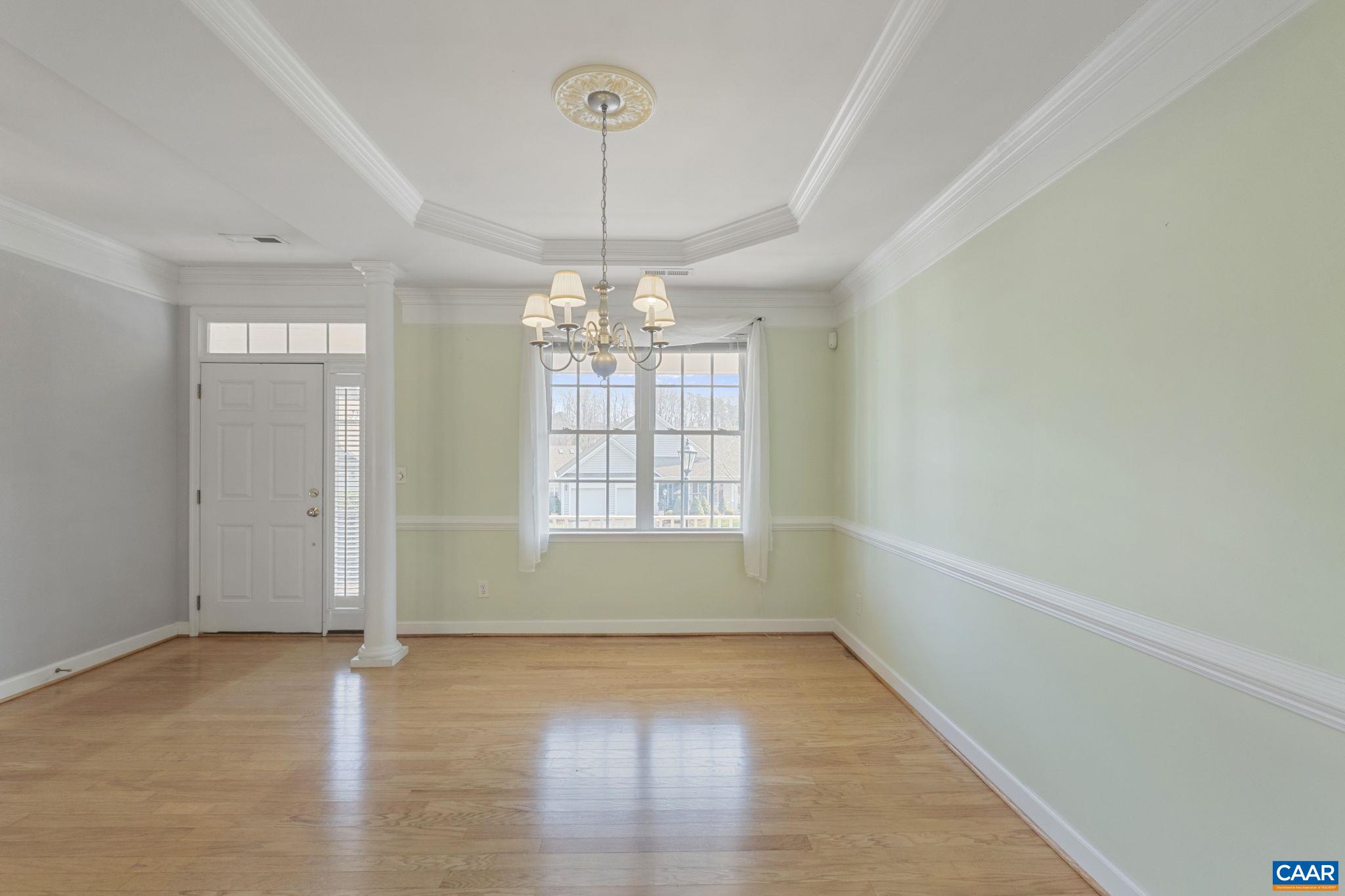 1118 Rustic Willow Lane Charlottesville, VA 22911 - Photo 5 of 33 a view of an empty room with wooden floor and a window