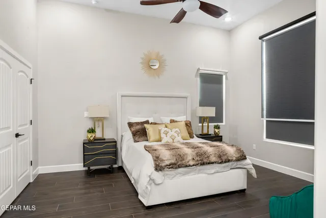 a bedroom with a bed and window