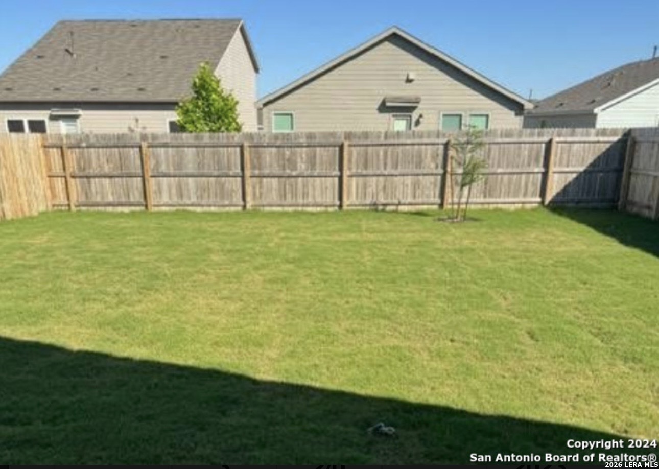 5958 Companion Loop Bulverde, TX 78163 - Photo 12 of 12 a view of a backyard