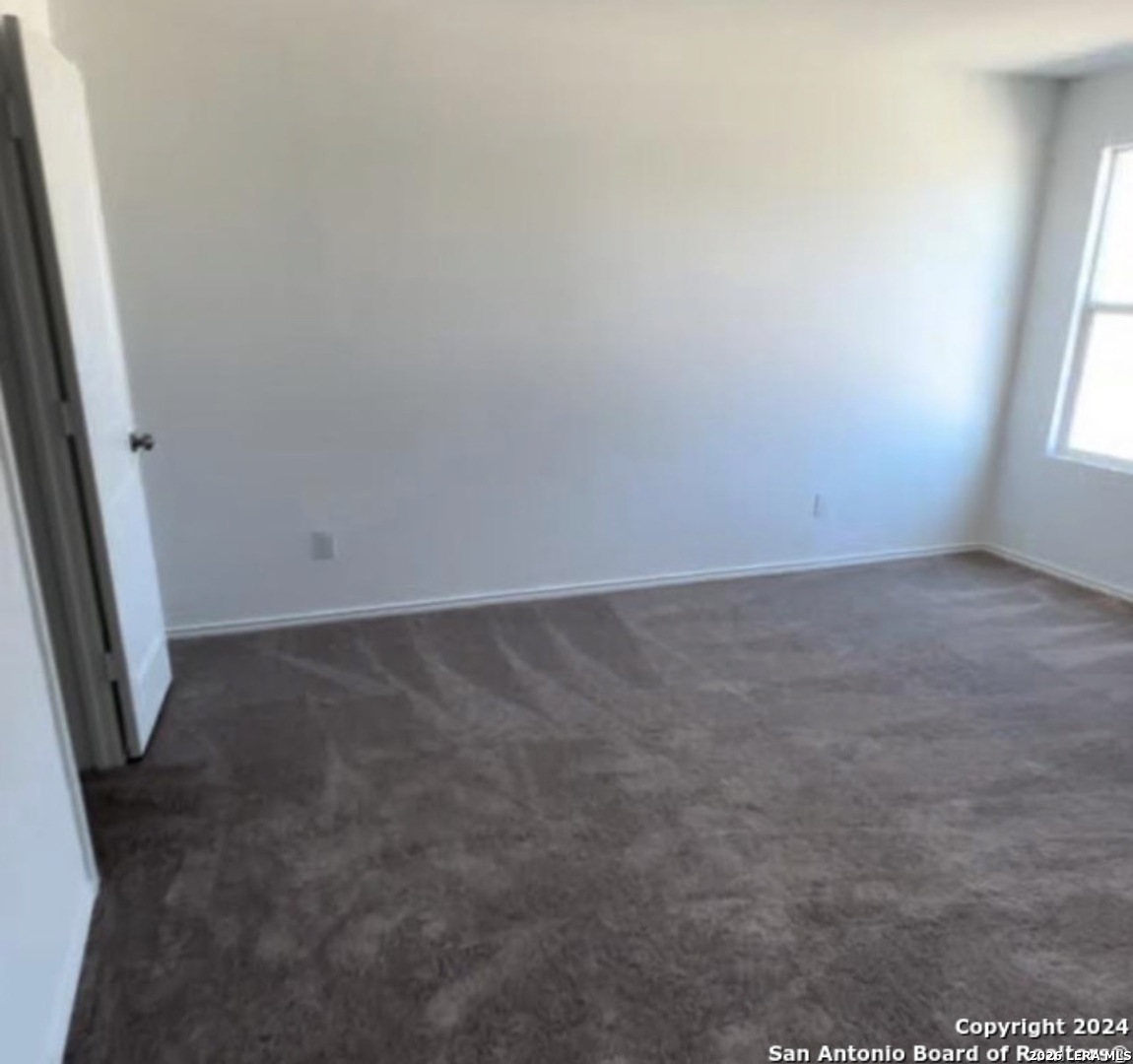 5958 Companion Loop Bulverde, TX 78163 - Photo 8 of 12 an empty room with windows