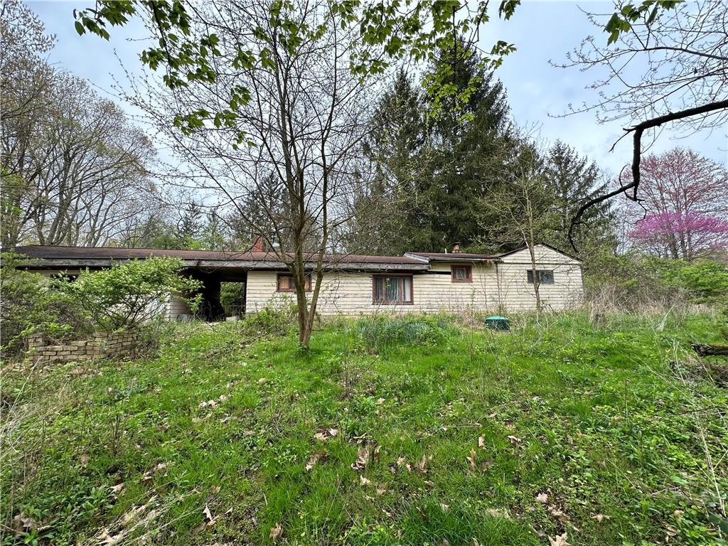14 Ridge Road Burgettstown, PA 15021 - Photo 4 of 9 a view of a backyard of the house
