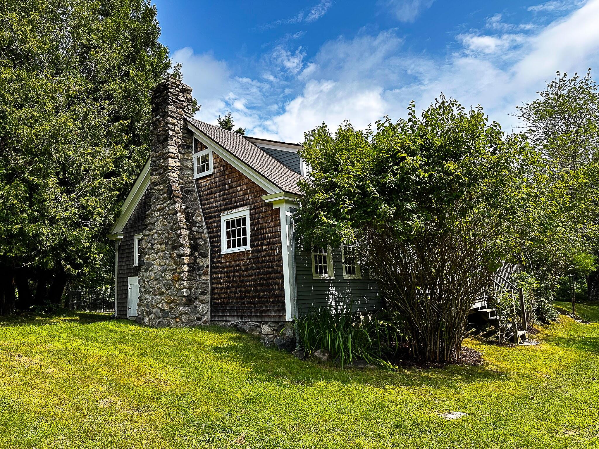 1319 Newbury Neck Road Surry, ME 04684 - Photo 58 of 68 Back wall and chimney of great room.