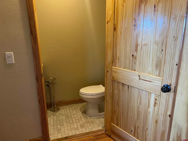 a bed room with furniture and a window