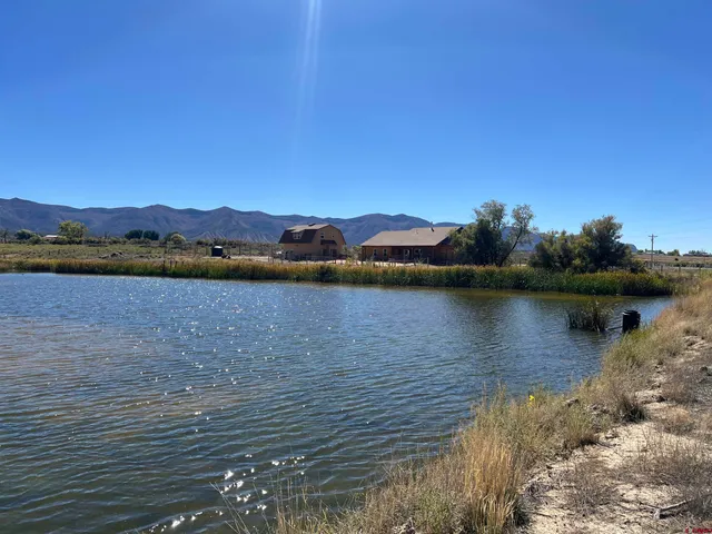 a view of lake with mountain