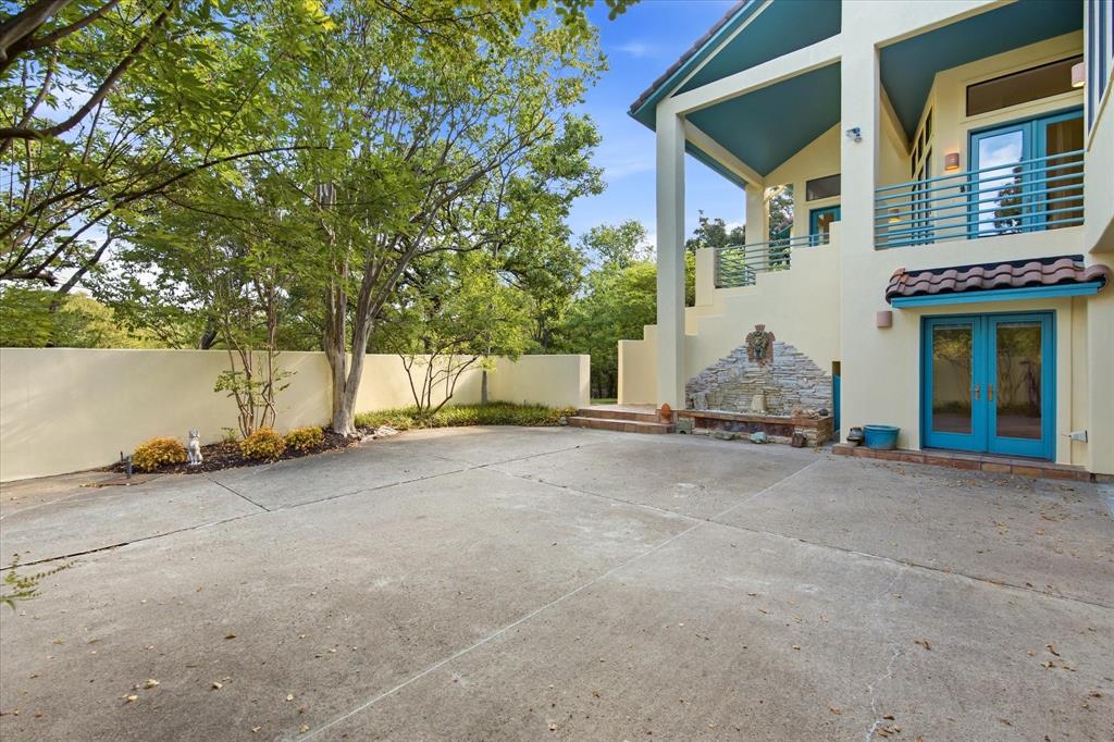 3606 Labrador Grapevine, TX 76051 - Photo 4 of 38 Multi-level stucco exterior with teal accents