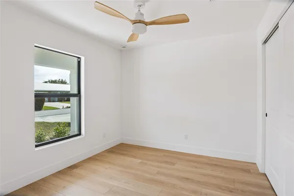 an aerial view of a house with a swimming pool