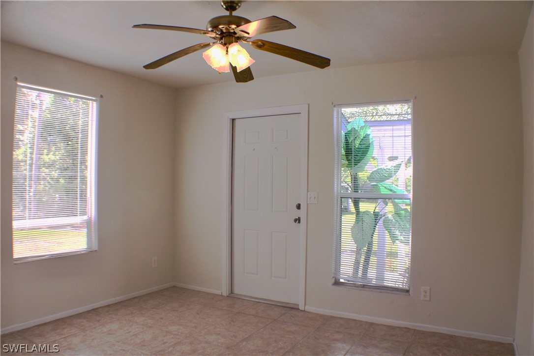 12210 Shawnee Road Fort Myers, FL 33913 - Photo 19 of 28 a view of an empty room with a window