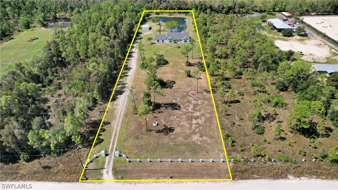 12210 Shawnee Road Fort Myers, FL 33913 - Photo 27 of 28 a view of a yard