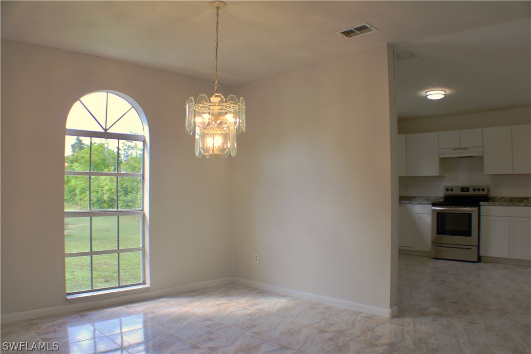 12210 Shawnee Road Fort Myers, FL 33913 - Photo 8 of 28 a view of a kitchen with dishwasher and a window