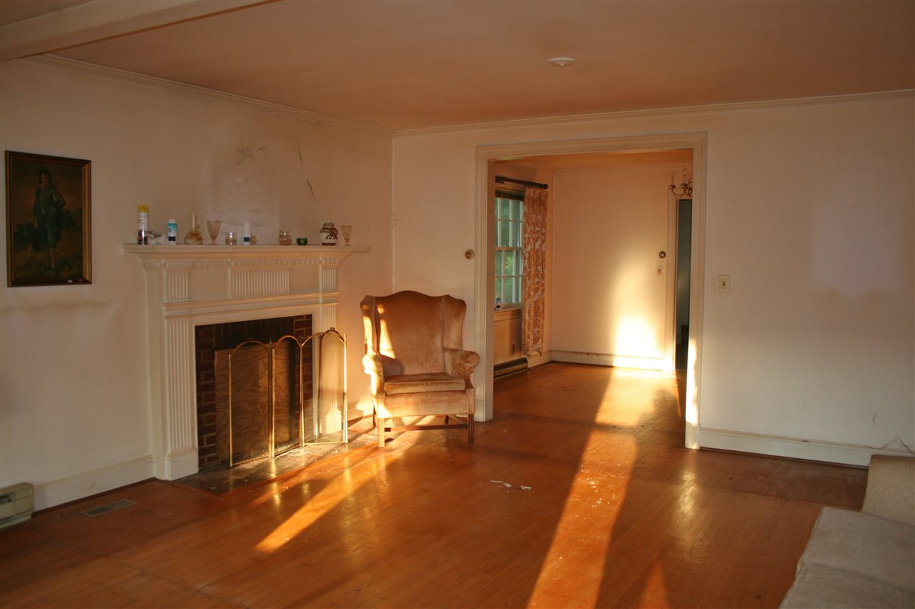 130 Bibb Store Road Louisa, VA 23093 - Photo 3 of 15 a view of a livingroom with furniture and a fireplace