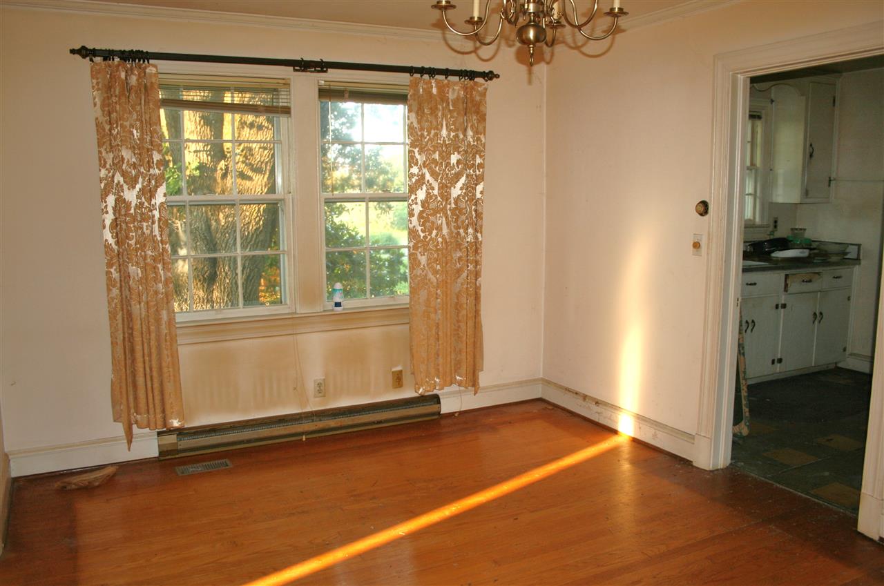 130 Bibb Store Road Louisa, VA 23093 - Photo 4 of 15 a view of a room with wooden floor and windows