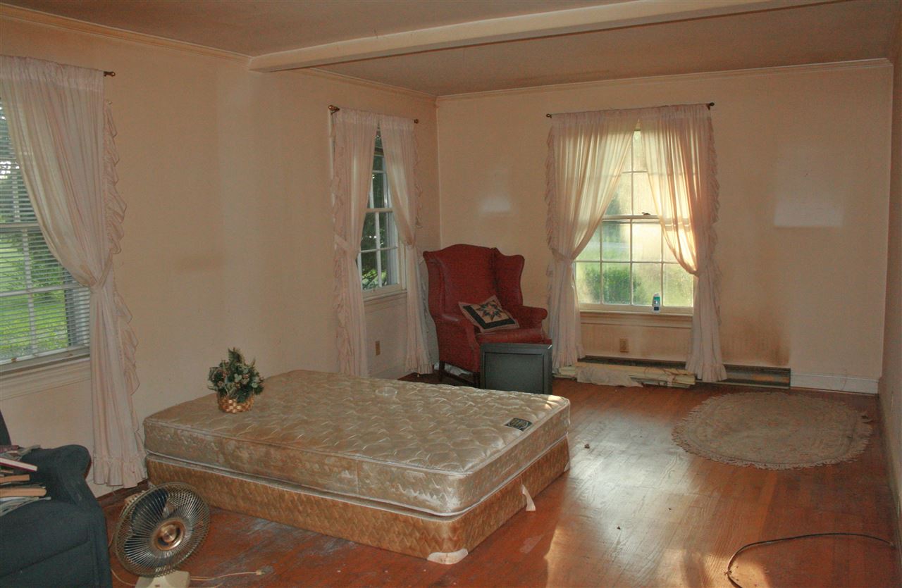 130 Bibb Store Road Louisa, VA 23093 - Photo 5 of 15 a room with a bed and furniture