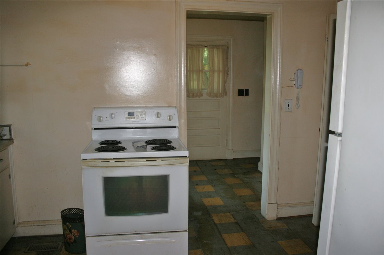 130 Bibb Store Road Louisa, VA 23093 - Photo 9 of 15 a stove top oven sitting inside of a kitchen