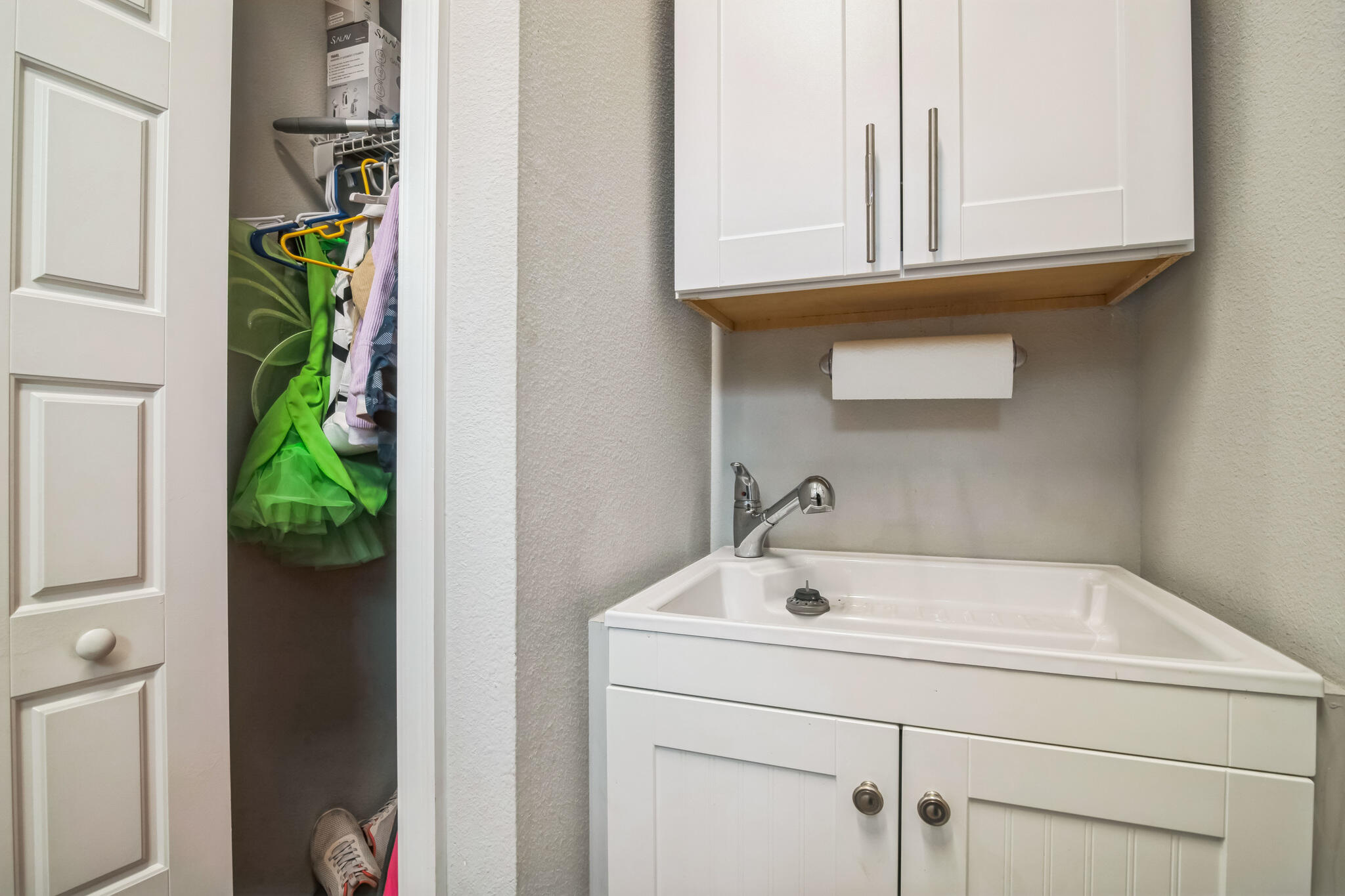 6450 Southwest 77th Street Gainesville, FL 32608 - Photo 15 of 30 a bathroom with a sink and mirror