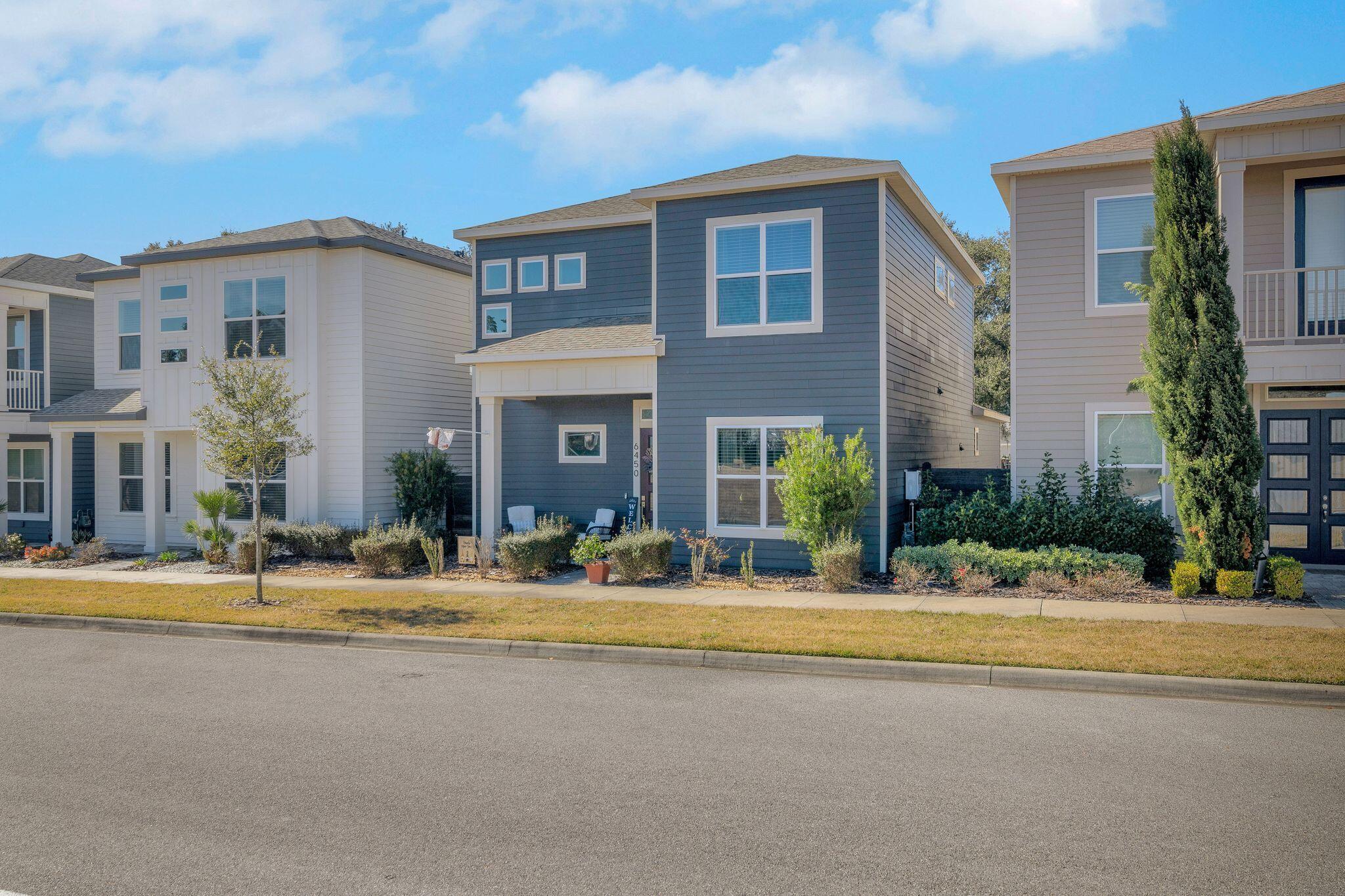 6450 Southwest 77th Street Gainesville, FL 32608 - Photo 2 of 30 a view of a building with a street