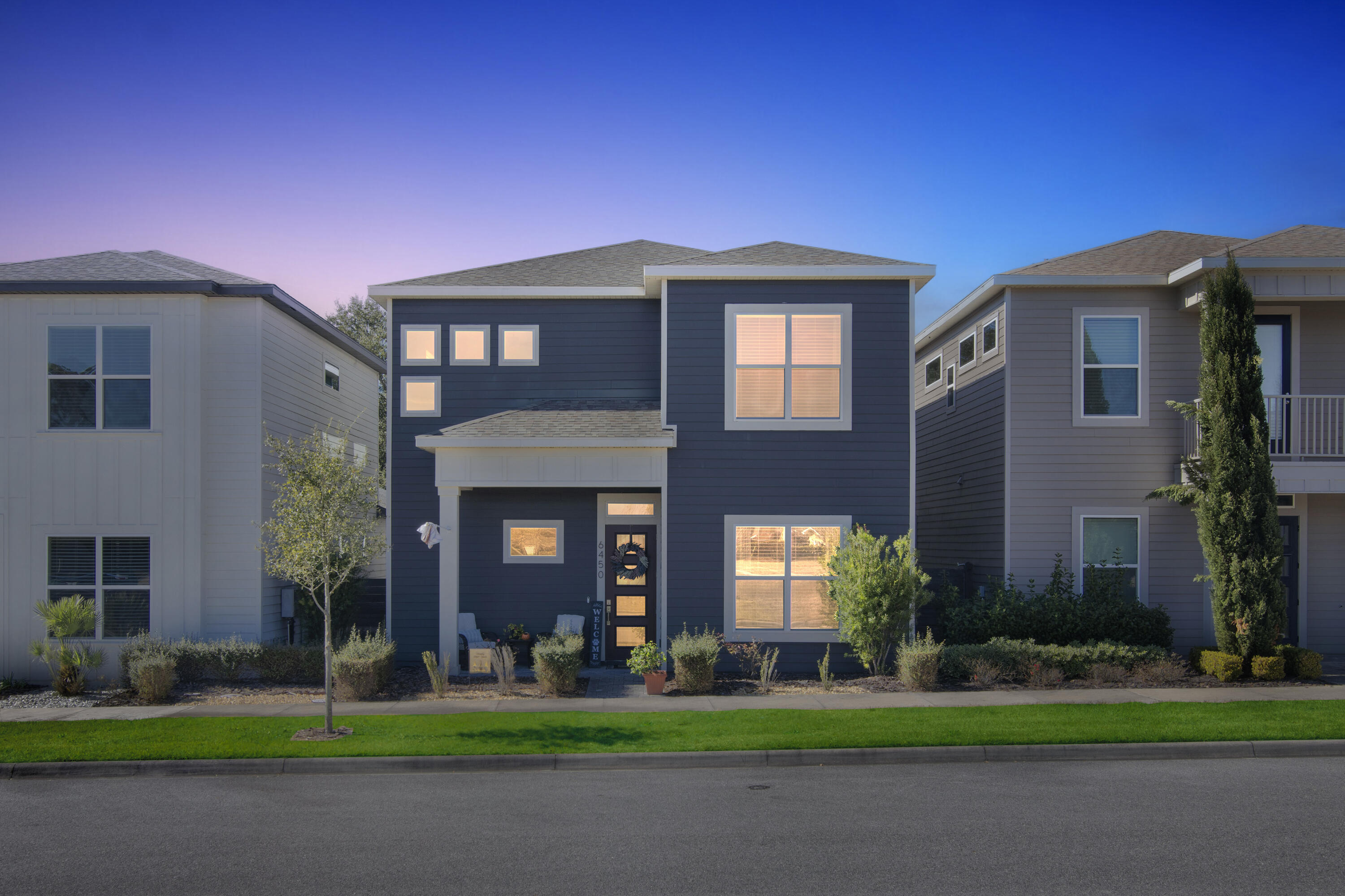 6450 Southwest 77th Street Gainesville, FL 32608 - Photo 29 of 30 a view of a brick house with a yard in front of it
