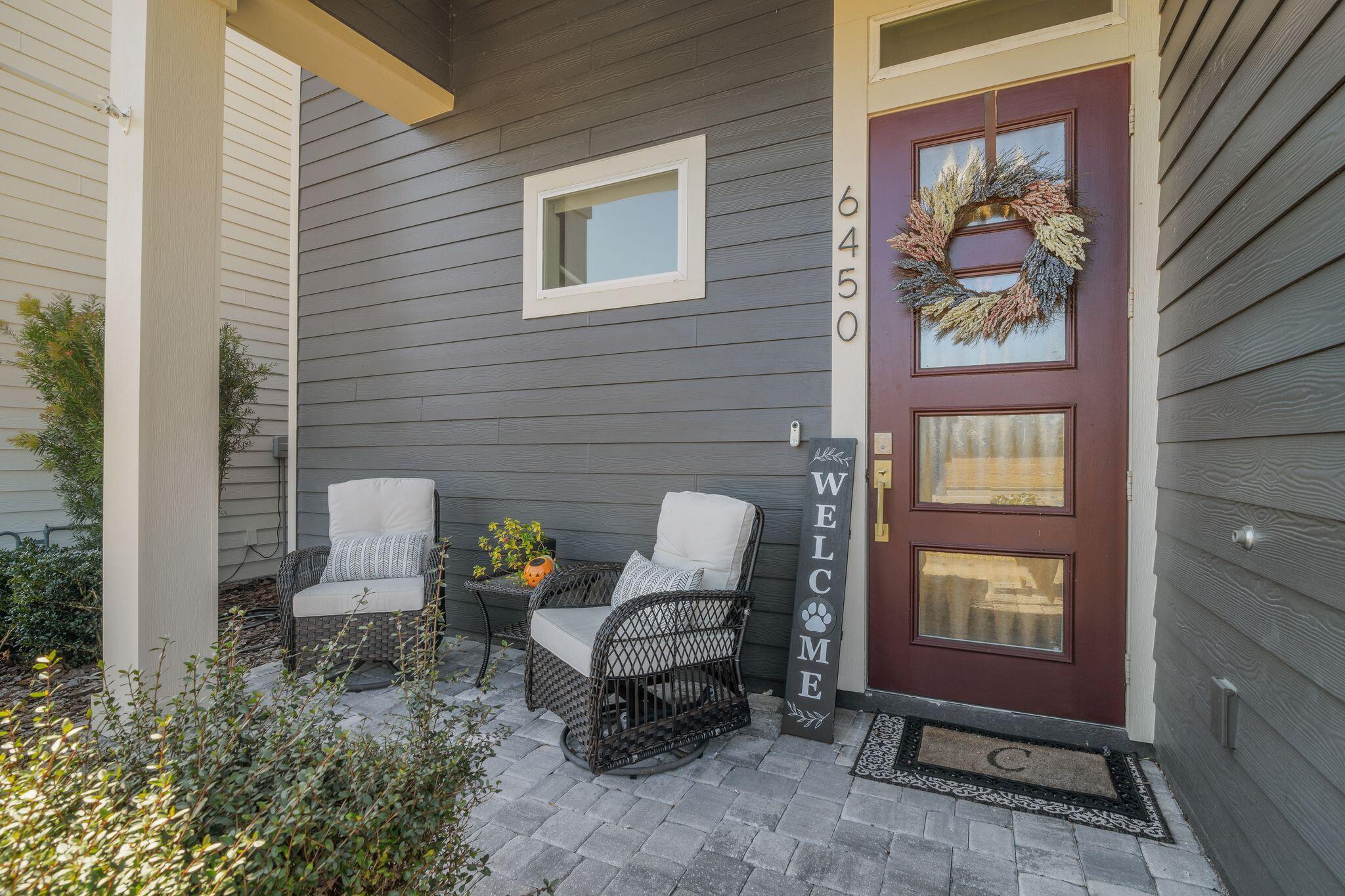 6450 Southwest 77th Street Gainesville, FL 32608 - Photo 5 of 30 a building outdoor space with patio furniture