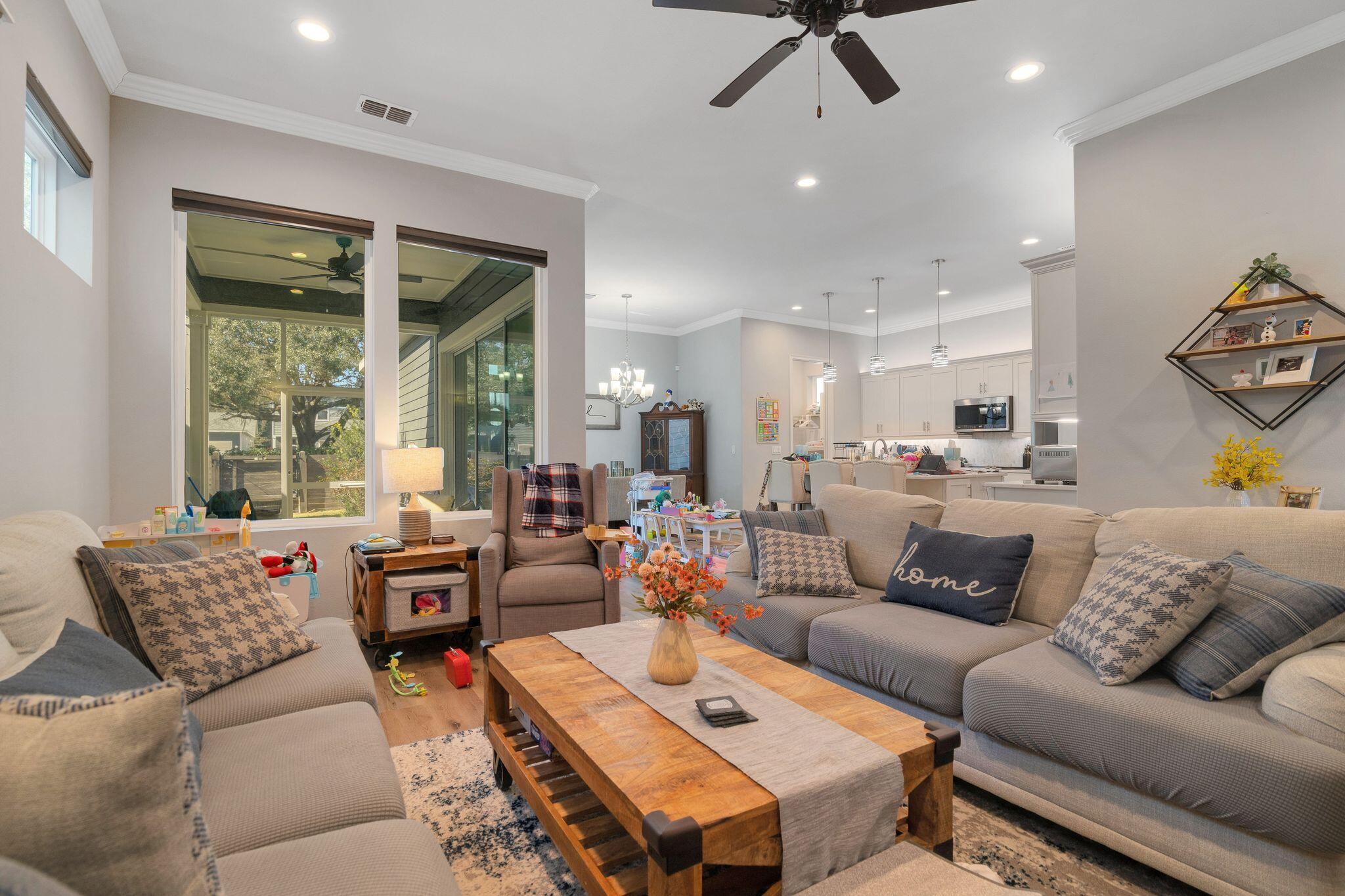 6450 Southwest 77th Street Gainesville, FL 32608 - Photo 7 of 30 a living room with furniture and a large window