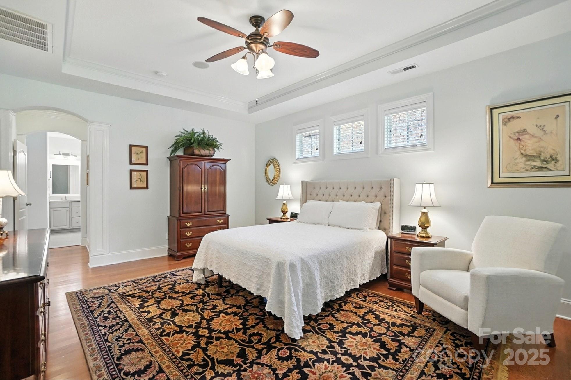 10906 Round Rock Road Charlotte, NC 28277 - Photo 18 of 45 a bedroom with a large bed and a couch