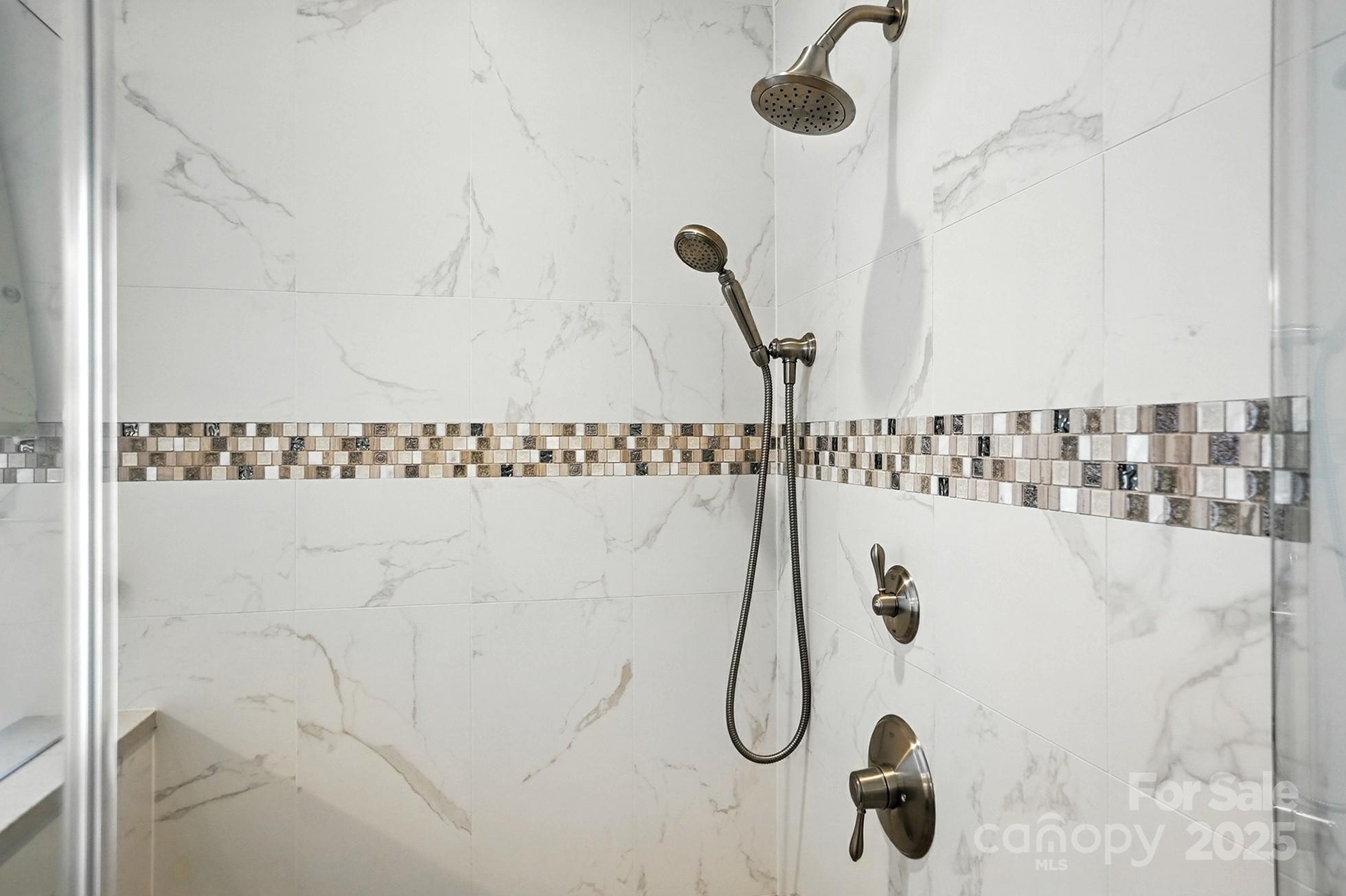 10906 Round Rock Road Charlotte, NC 28277 - Photo 22 of 45 a bathroom with a shower