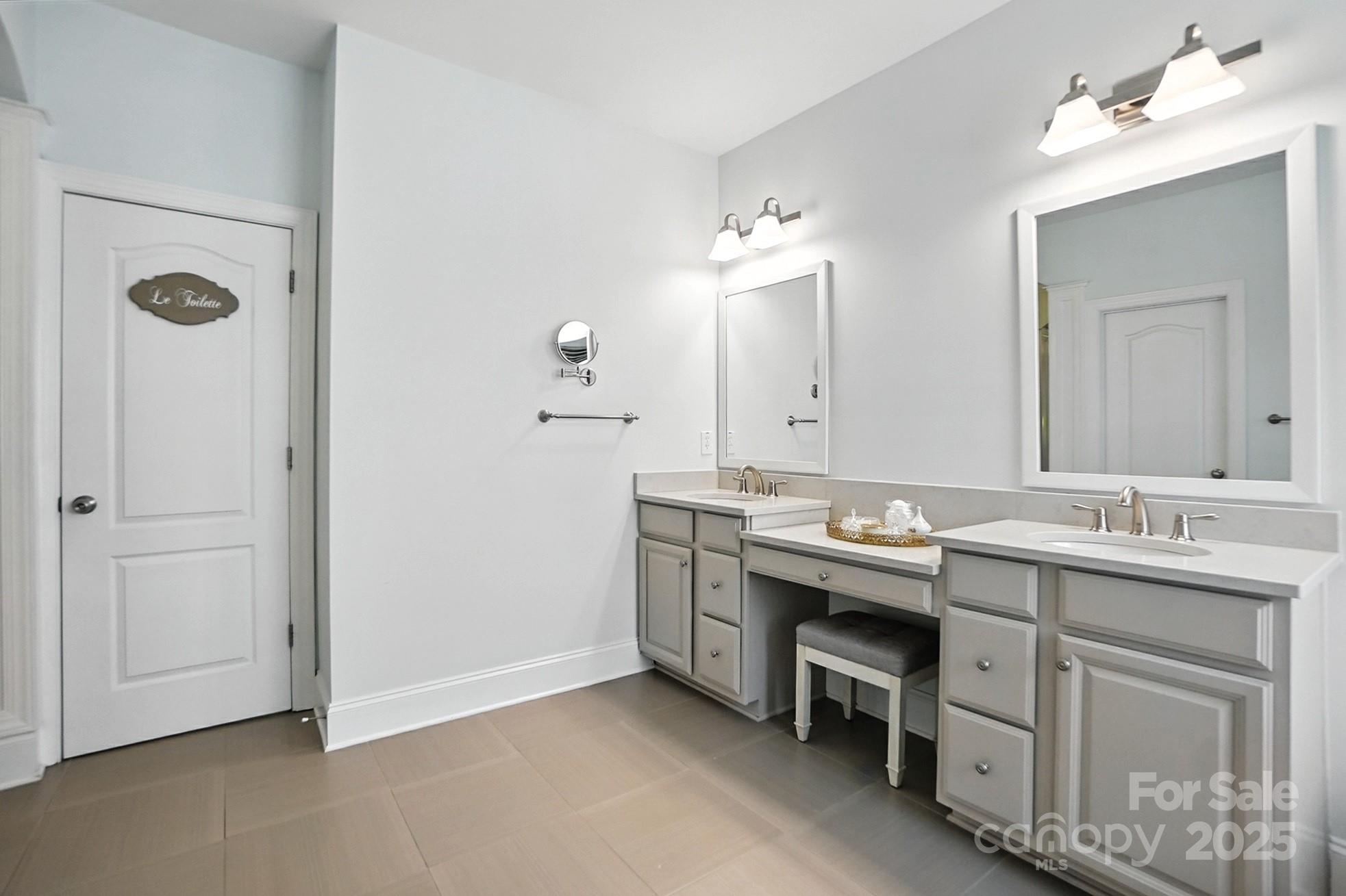 10906 Round Rock Road Charlotte, NC 28277 - Photo 23 of 45 a view of bathroom with dual sinks