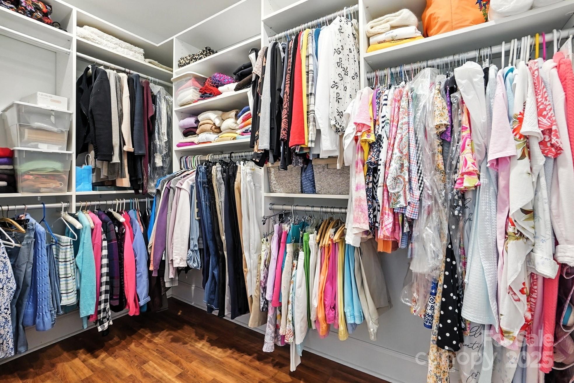 10906 Round Rock Road Charlotte, NC 28277 - Photo 24 of 45 a view of walk in closet with clothes