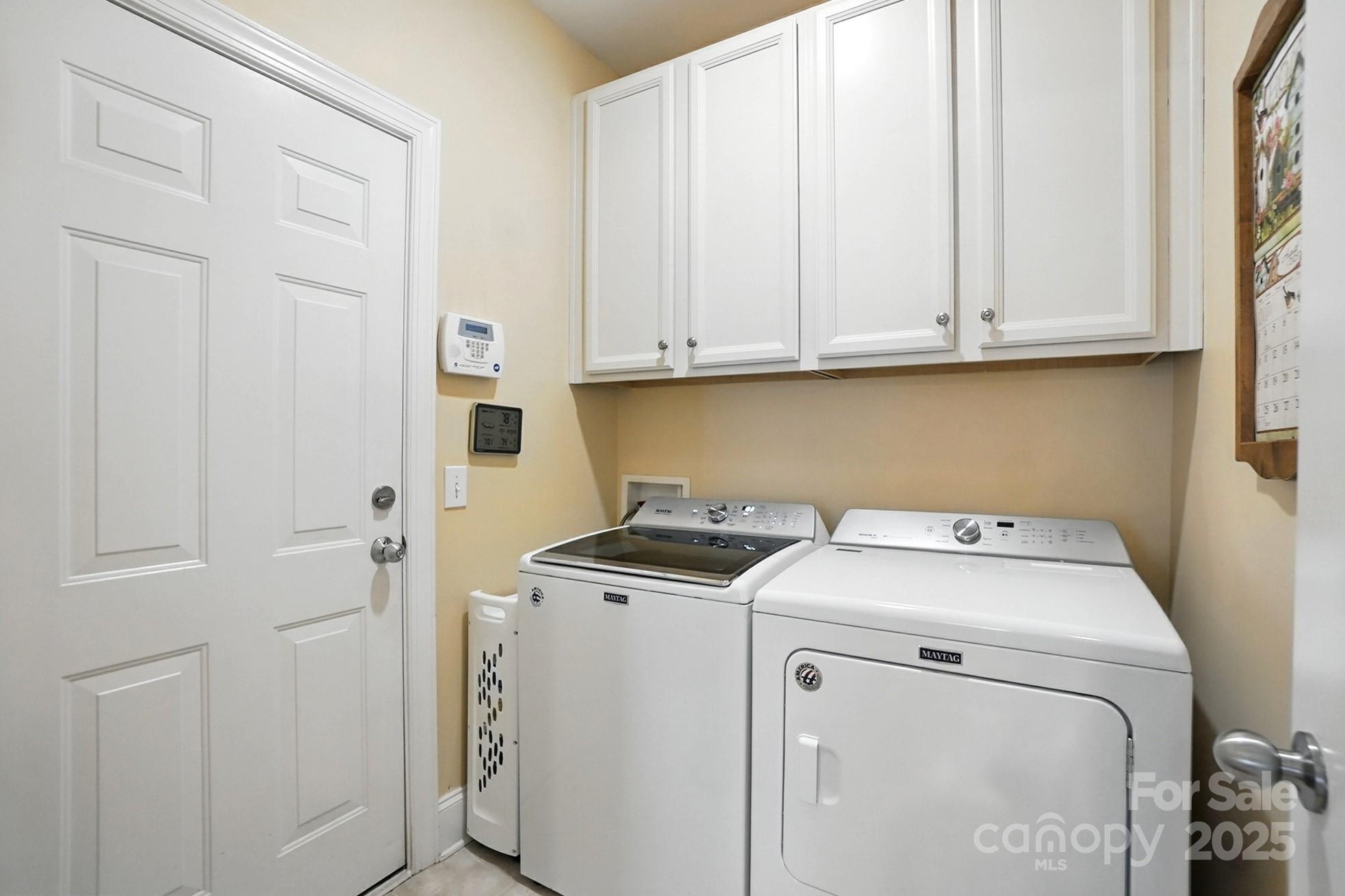 10906 Round Rock Road Charlotte, NC 28277 - Photo 25 of 45 a utility room with dryer and washer